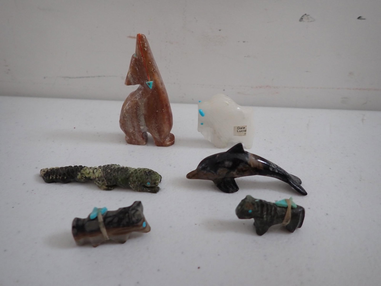 Zuni miniature carved animals: Dolphin, Ram with "Gale Lucio" label & others.