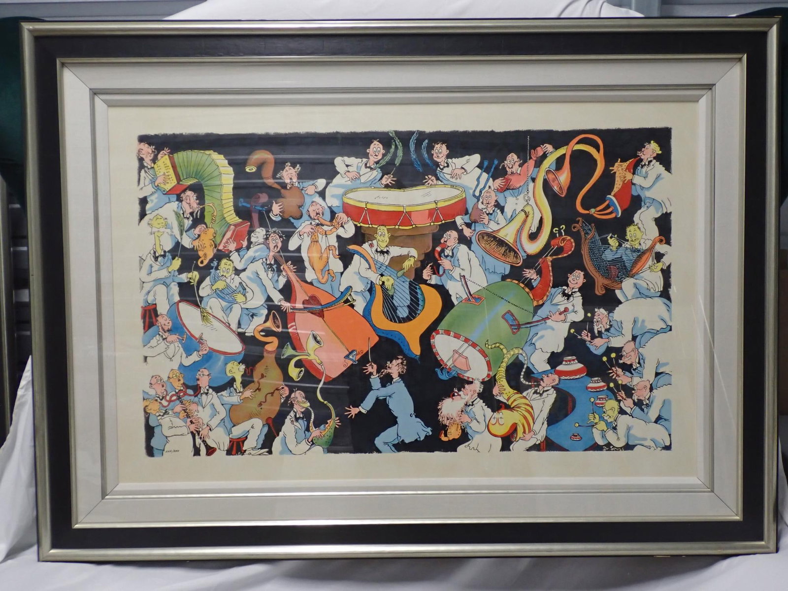 Incidental Music for a New Year's Eve Party: .Dr.Seuss ltd edition Serigraph on Archival paper signed no 222/850 frame 36" x 50" print 25" x 28." Frame has some minor marring and paint loss