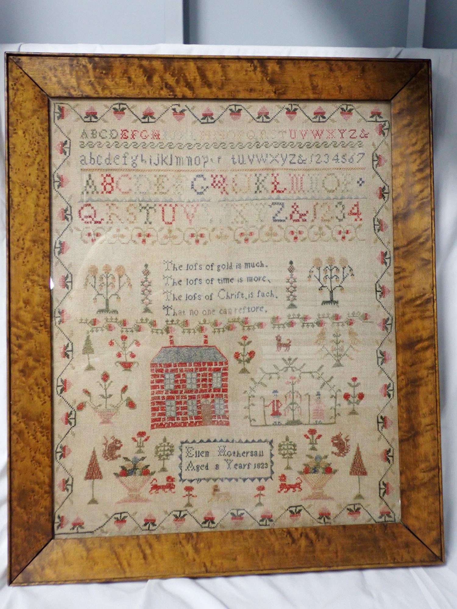 1823 Ellen Hothersall English Sampler: Ellen Hothersall Aged 8 Years 1823 sampler depicting alphabet, numbers and various decorative items, religious poem in center Frame 24" x 20" sampler 20 1/2" x 16"