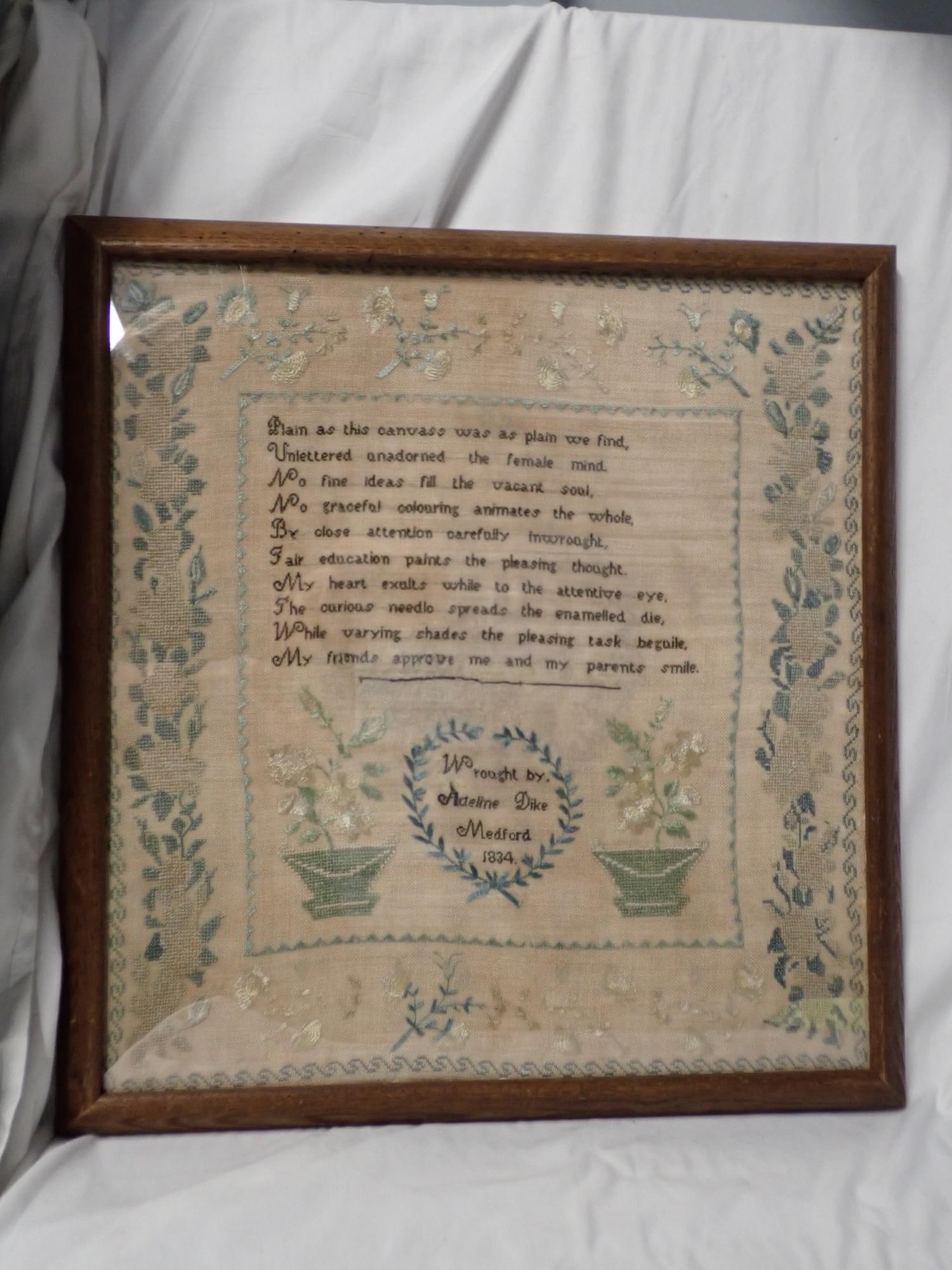 1834 Adeline Dike Sampler: 1834 Adeline Dike . Wrought by Madeline Dike Medford 1834. Appears to be original verse in middle floral design Frame 19" x 17" Sampler 17" x 16" check paperwork on back appears to have been written