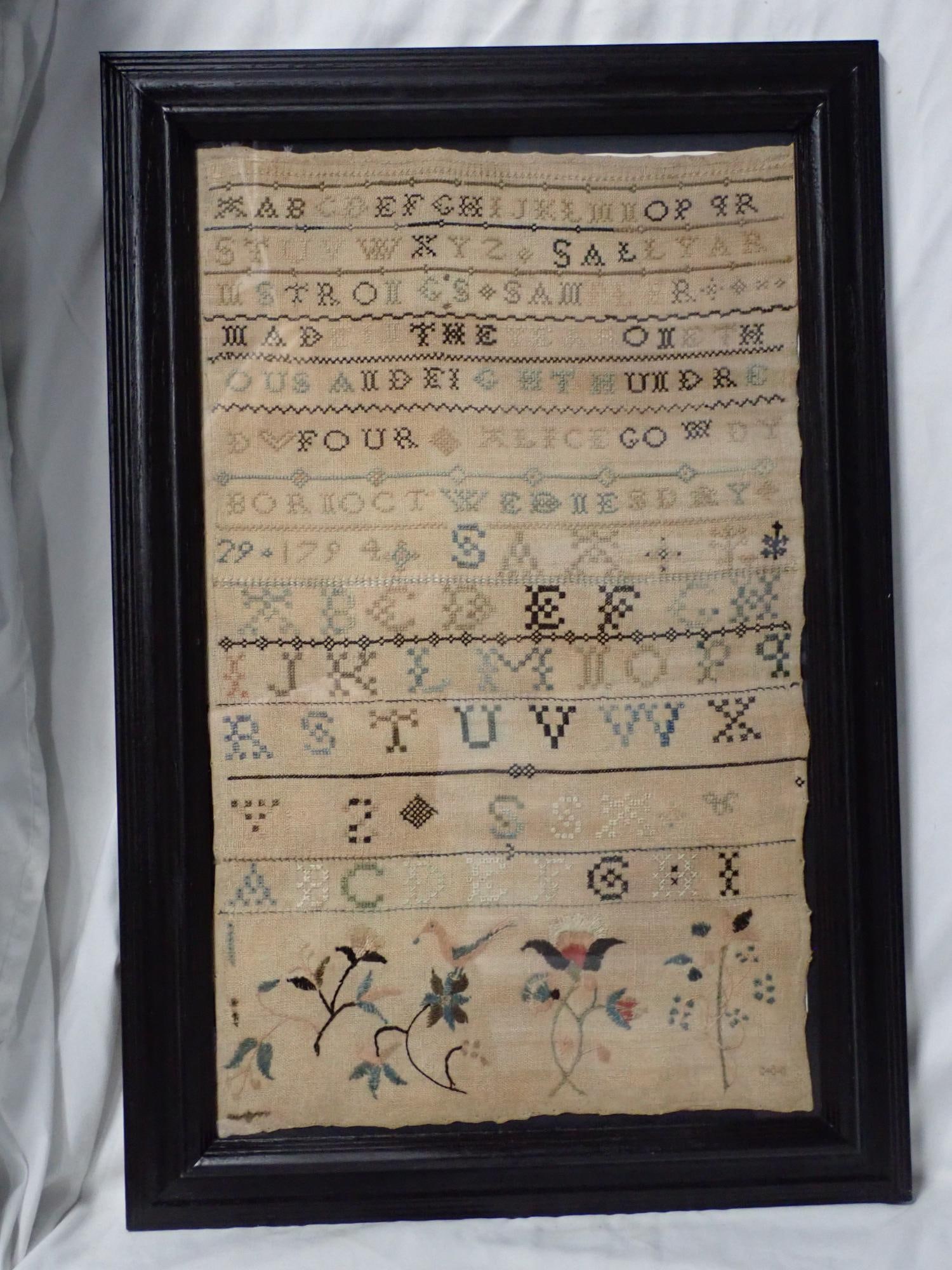 1804 Sally Armstrong Sampler: Sally Armstrong's Sampler Made in the year one thousand and eight hundred four Alice Gowdy born Oct Wednesday 29, 1794 depicting alphabet and some nice crewel work of birds and flowers at bottom