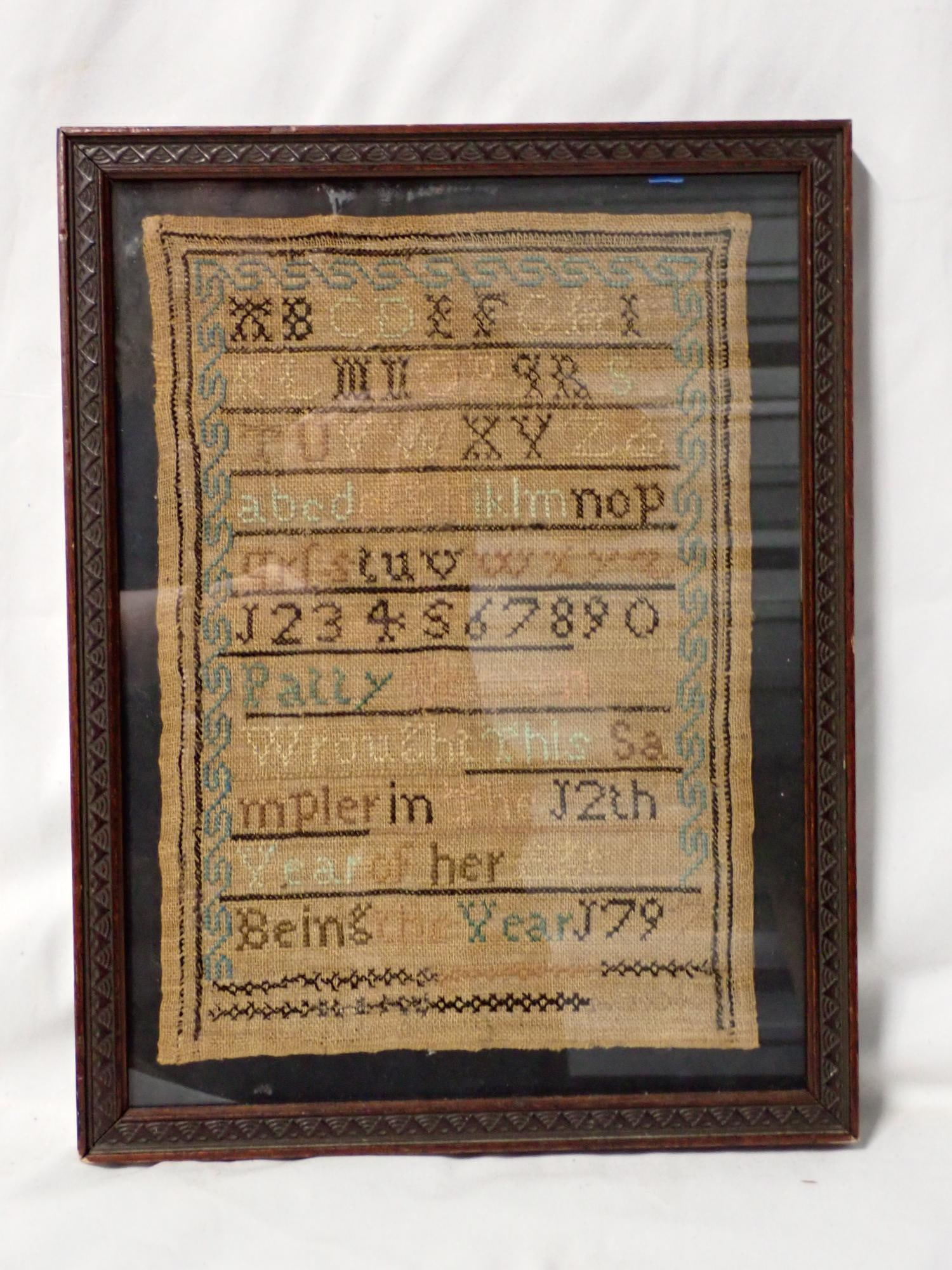 1797 Patty Brown Sampler: Patty Brown Wrought this sampler in her 12th year of her life being the year 1797. Motif Alphabet, numbers and geometrical designs. Some fading and discoloration. Frame 13" x 10. Sampler 10 1/2" x 7