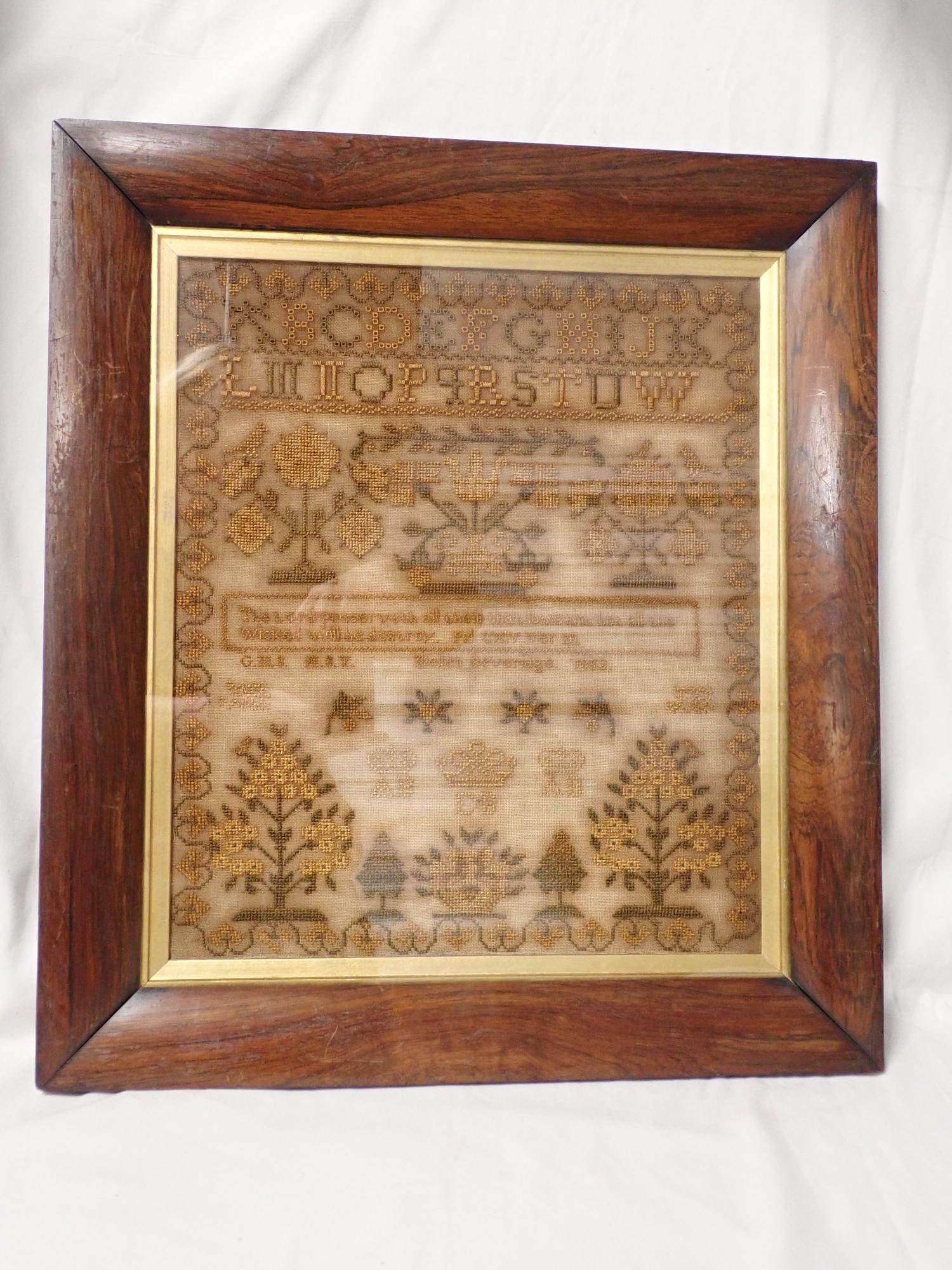 1862 Hellen Severidge Sampler: Hellen Severage G.M.S. M.S.Y. ?? Lots of Gold thread. Alphabet floral motif religious verse in center. Some dye bleeding and discoloration. Stitching eyelet stitch, Crewel work and cross stitch. Frame