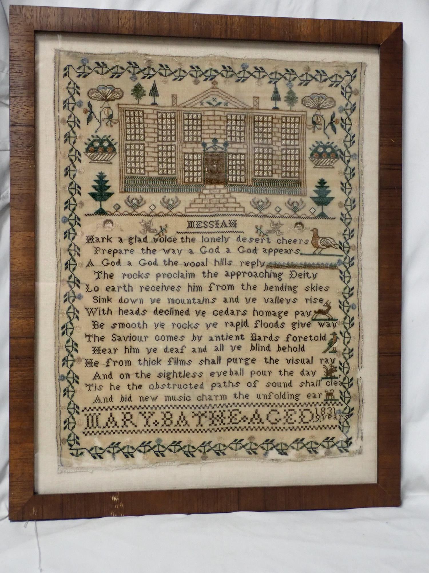 1831 Mary Bathe Sampler: Mary Bathe Aged 1831 Aged 9 Years. Religious verse in center, Large building on top with flowers cherubs birds. vine border some fabric and thread loss along edges. Frame 20 1/2" x 16 1/2" Sampler