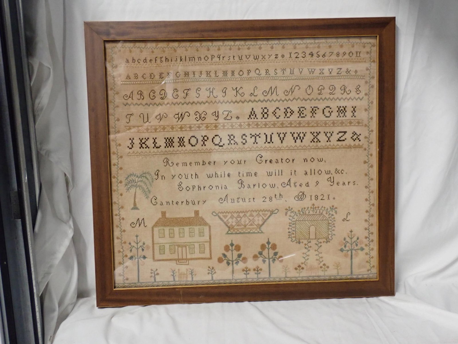 1821 Sophronia Barlow Sampler: Sophronia Barlow Remember your Creator now, In youth while time will it allow & c. Sophronia Barlow Aged 9 Years, Canterbury August 28th AD 1821, Motif house, basket, flowers, frees Vine and flower