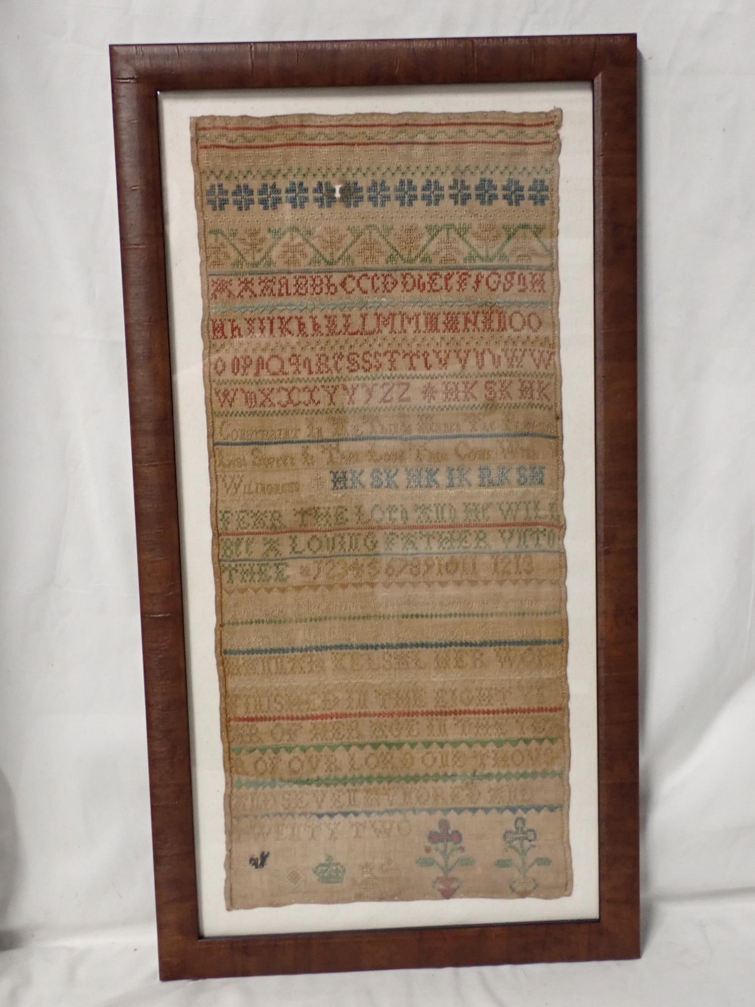 1722 Hanna Kelsal Sampler: Hanna Kelsal with alphabet, numbers, religious verse. geometrical design, some floral design at bottom, Fabric loss, discoloration Frame 20 1/2" x 11." Sampler 17 1/2" x 8"