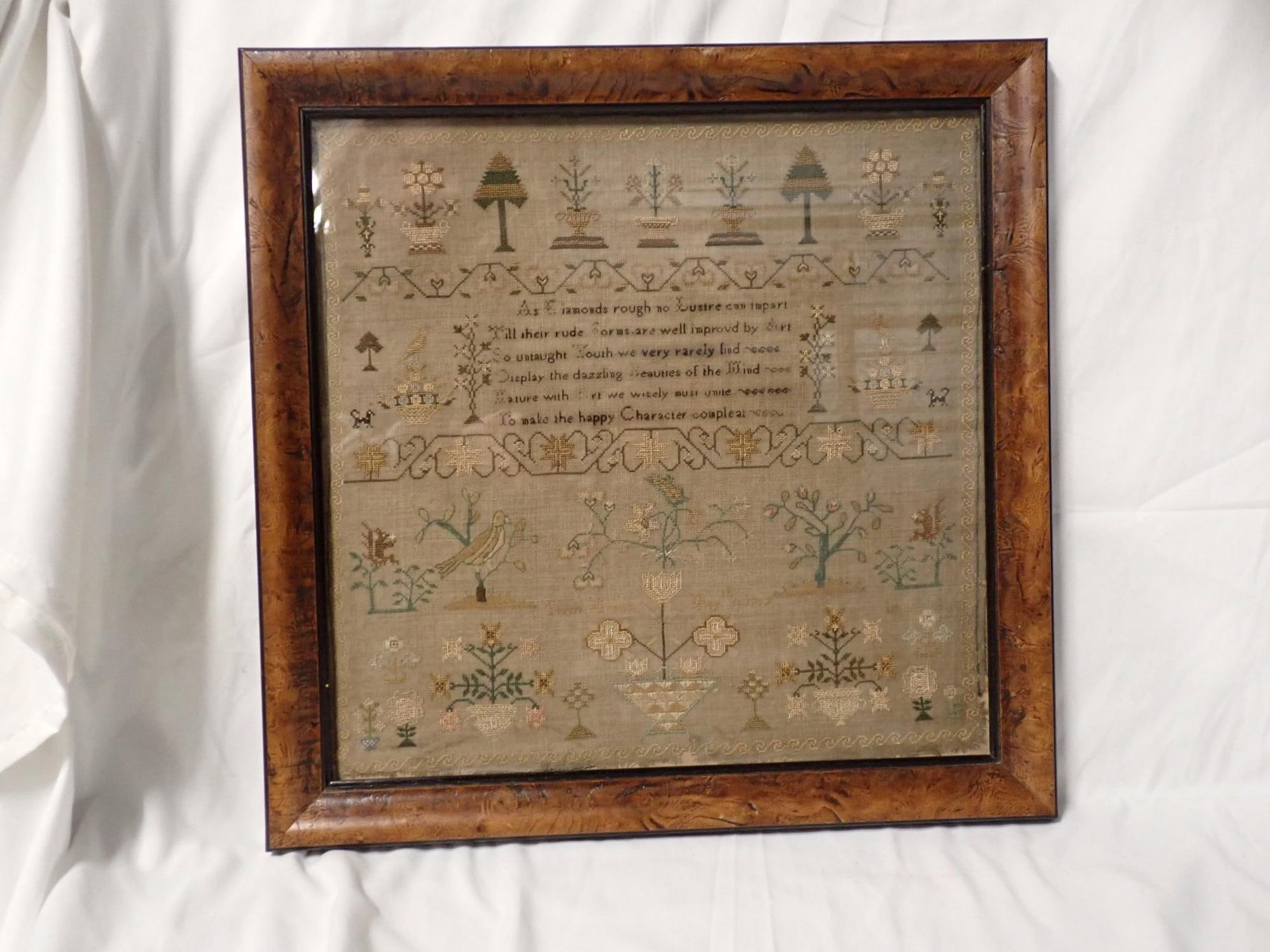 1797 Sarah Morris Sampler: Sarah Morris Sampler with verse May 18th 1797. Motif floral and birds and trees. fabric fading and thread loss. Fabric loss on edges. Frame 15 1/2" x 15 1/2" Sampler 13"x 13"
