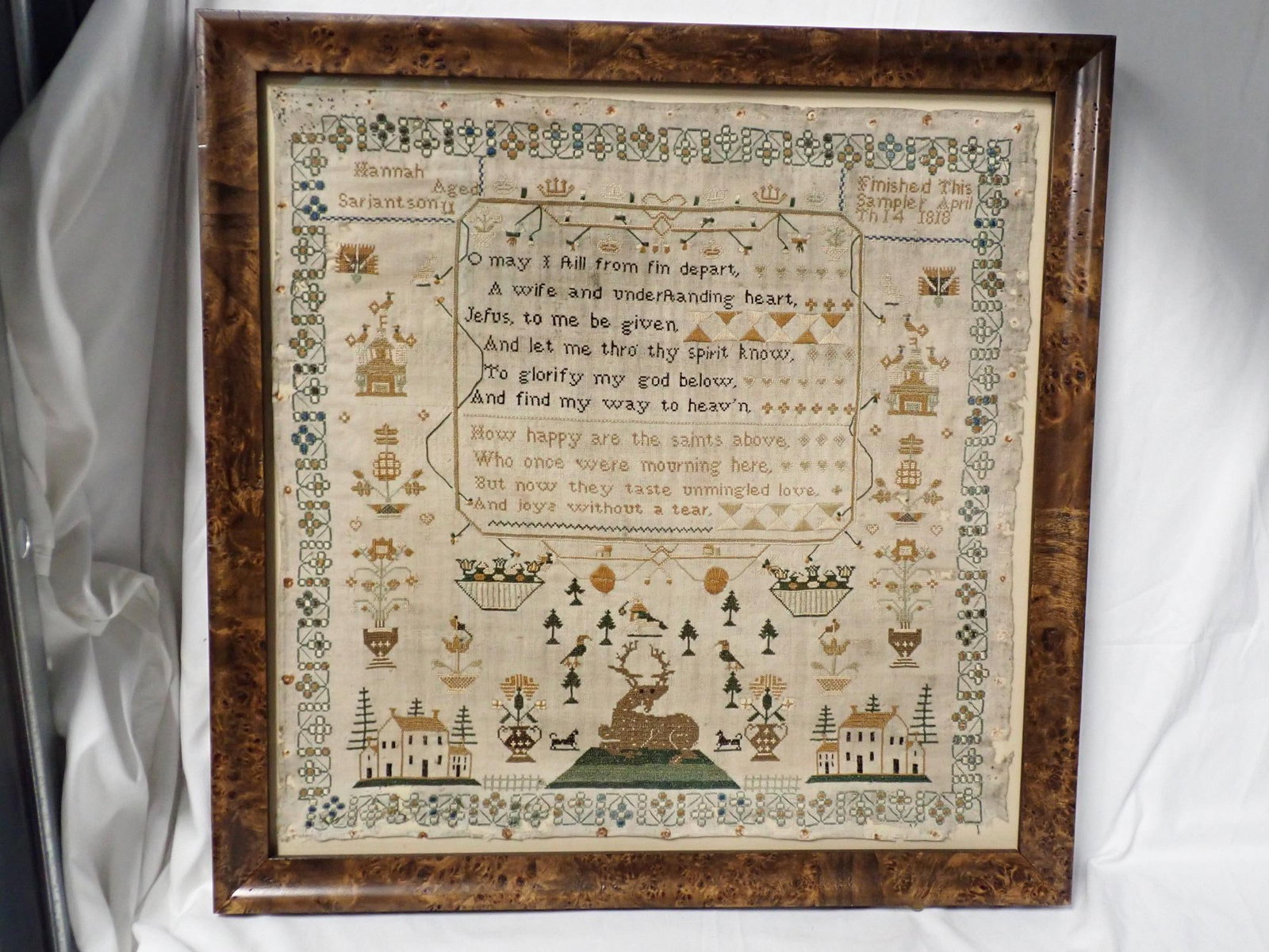 1818 Hannah Sarjantson Sampler: Hannah Sarjantson Aged 11 Finished this Sampler April TH 14 1818. Motif animals, houses birds geometrical floral border Some fabric loss and staining Frame 20 3/4" x 20 1/2" Sampler 17 1/2" x 17 1/2"