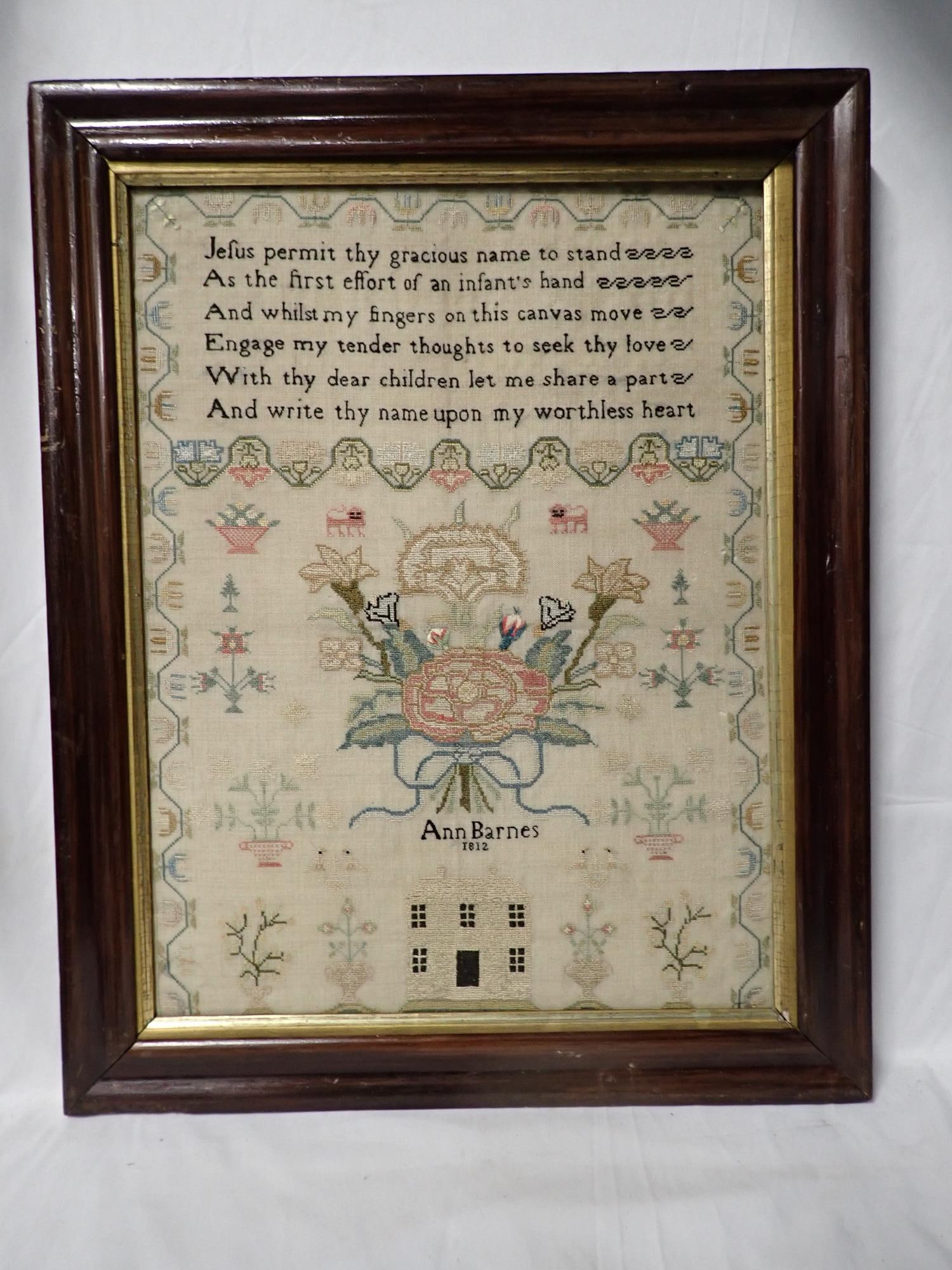 1812 Ann Barnes Sampler: Ann Barnes 1812 Religious verse at top. Motif Floral and house border geometrical. Frame 20 1/2" x 16 1/4" Sampler 16 1/4" x 12 1/2" no glass