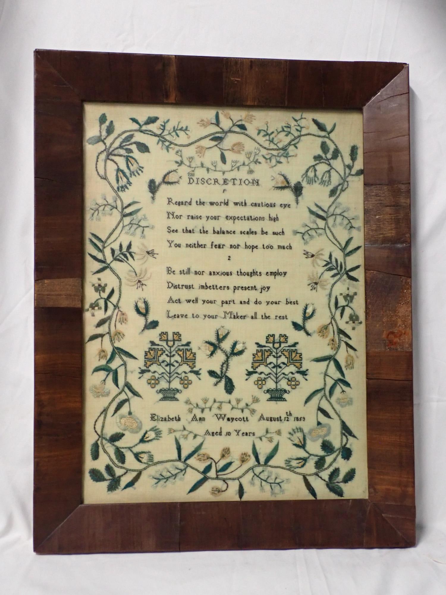 1853 Elizabeth Ann Waycott Sampler: Elizabeth Ann Waycott August 12th 1853 Aged 10 years. Religious verse "Discretion" 2 numbered verses. Floral motif, Crewel Floral and vine border. Frame 20" x 15 1/2" Sampler 16 1/2" x 11 3/4"