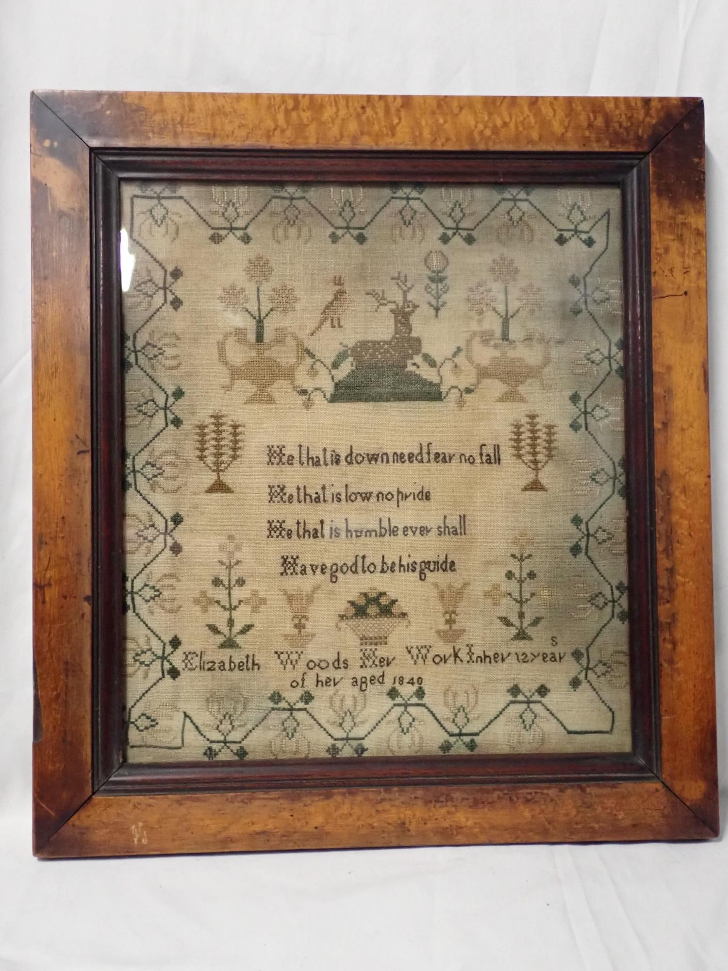 1840 Elizabeth Woods Sampler: Elizabeth Woods her work in her 12 year of her aged 1840. Religious verse in center. Motif stag, birds, urns, flowers. Vine border. Fabric discoloration. Frame 15 3/4" x 14 1/4" Sampler 12" x 10 1/2"
