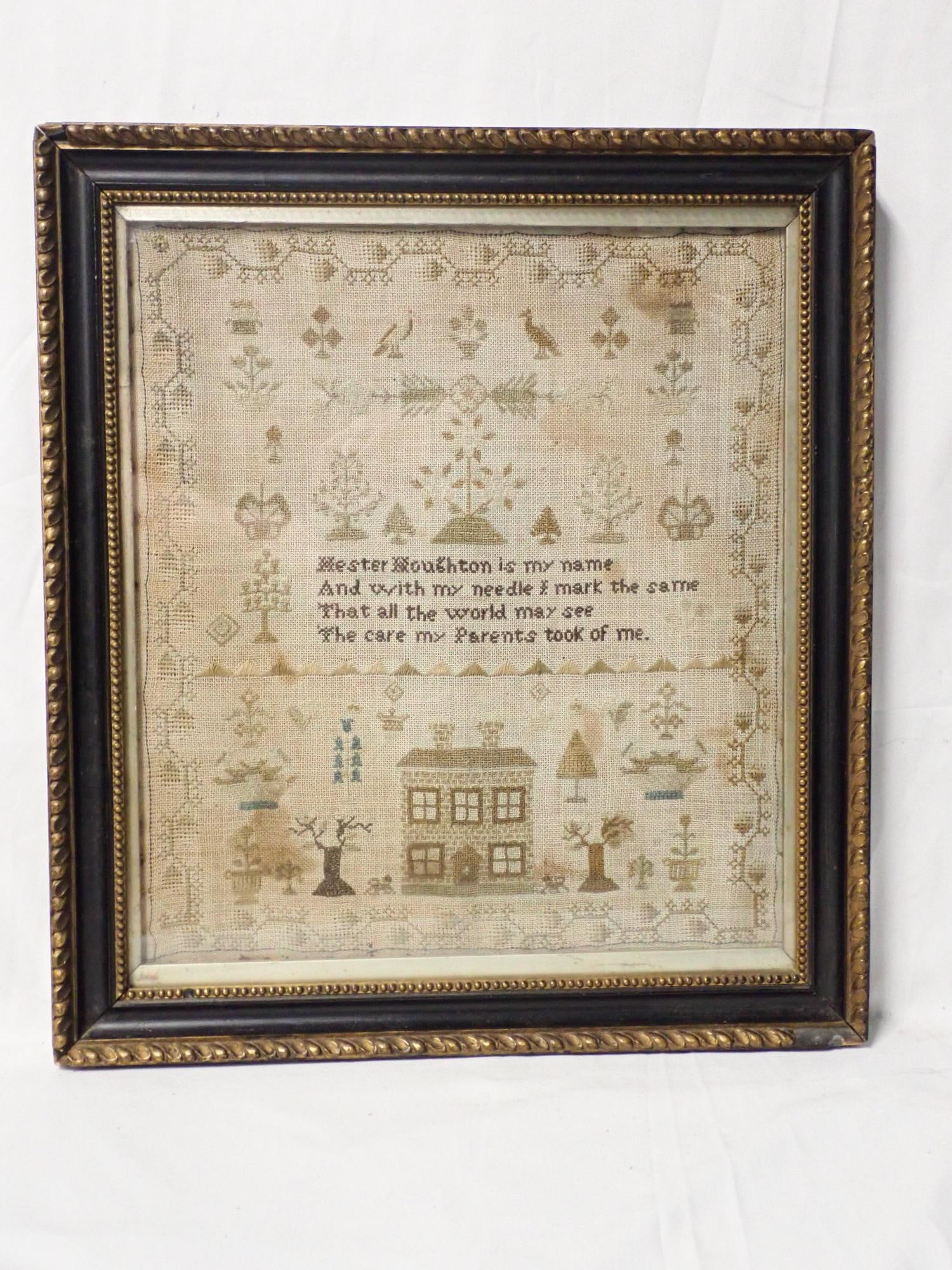 Hester Houghton Sampler not dated: Hester Houghton verse in center. Motif is House, trees, flowers birds, Vine and floral border. Fabric discoloration, fading and some staining . Frame 14 3/4" x 13 1/4" Sampler 12"x 10 1/2"