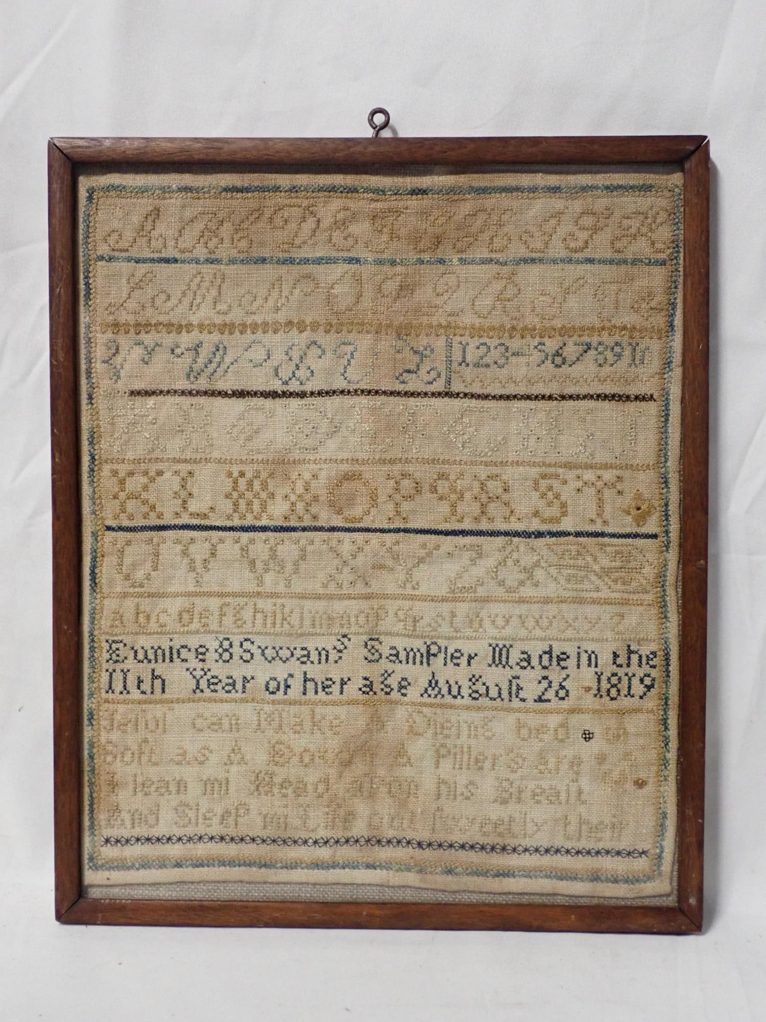 1819 Eunice B Swan Sampler: Eunice B Swan's sampler made in the 11th year of her age August 26 1819.. Alphabet and numbers Verse at bottom Fabric staining , discoloration and fading Frame 11" x 9 1/4" Sampler 10" x 8 1/4"