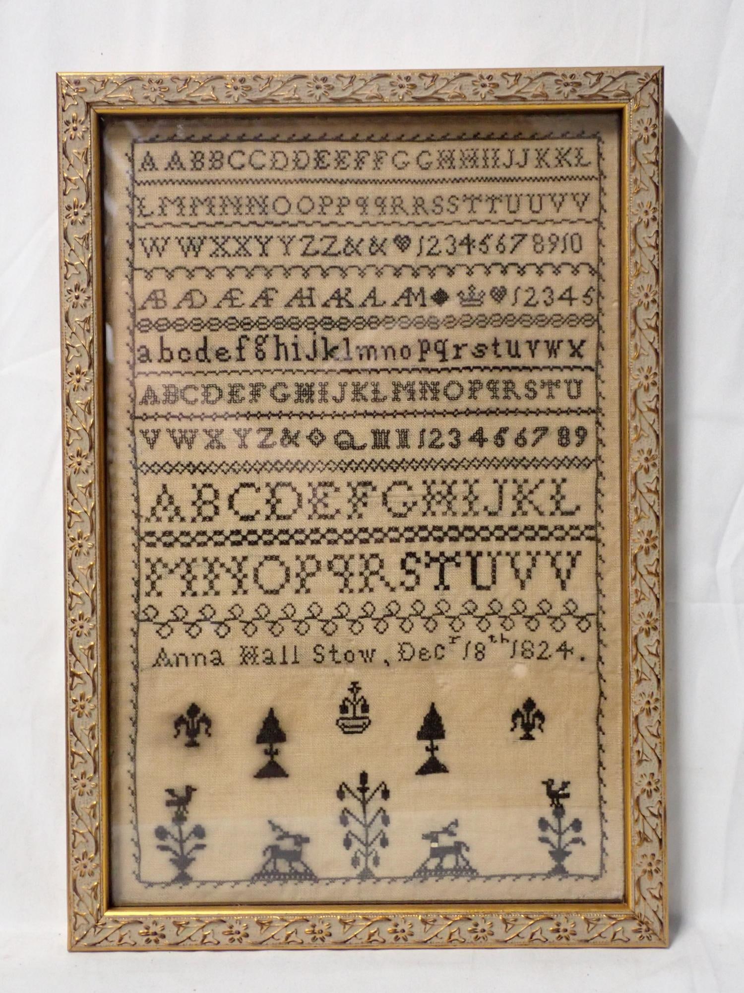 1824 Anna Hall Stow Sampler: Anna Hall Stow Dec 18th 1824. Alphabet and numbers. Motif trees, animals. Small hole under 1824. Frame 13 1/2" x 9 1/4" Sampler 12 1/4" x 8"