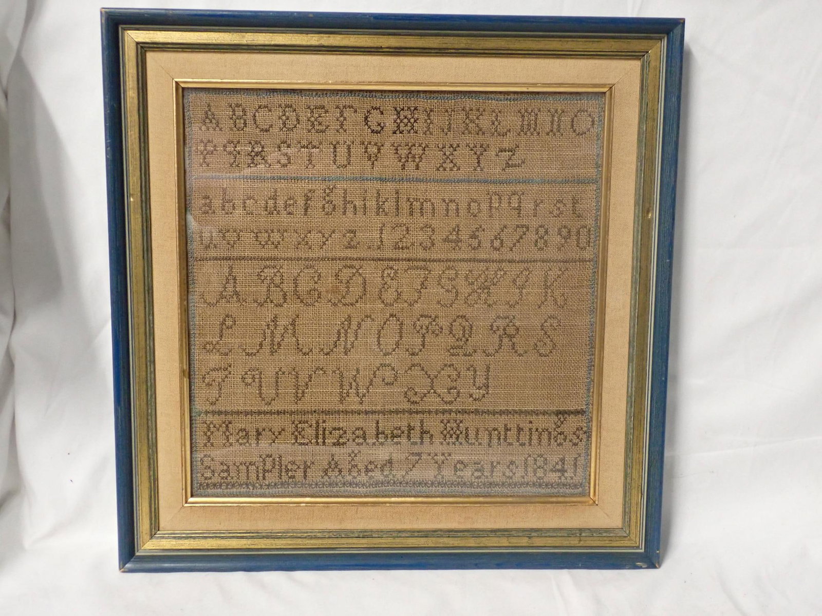 1841 Mary Elizabeth Huntting Sampler: Mary Elizabeth Hunttings Sampler Aged 7 years 1841. Alphabet and numbers. Frame 14 1/2" x 14 1/2". Sampler 10 3/4" x 10 3/4"