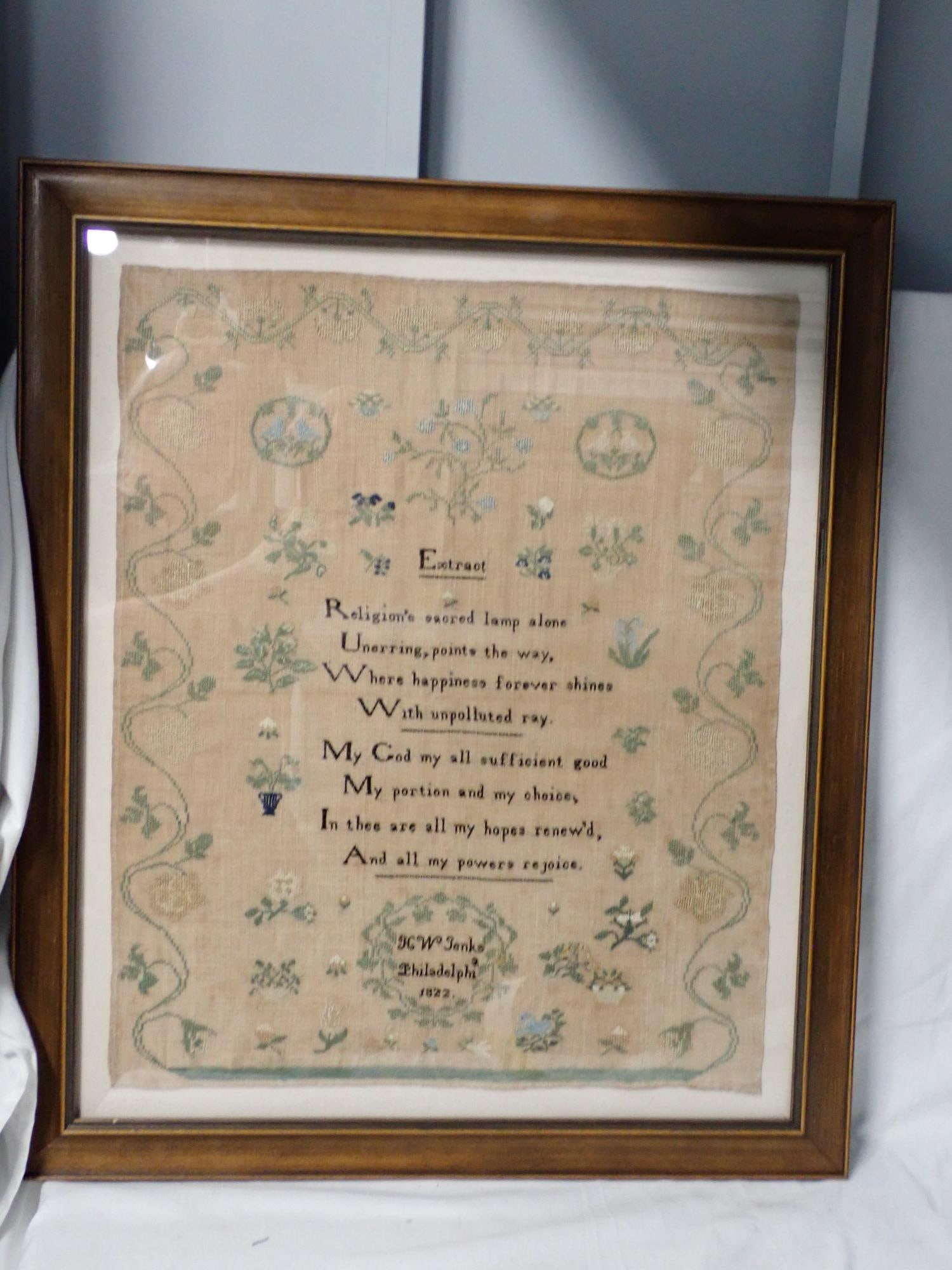 1822 H W Jenks Sampler: H W Jenkins Philadelphia 1822. Religious verse in center "Extract"/ Floral design. Vine and floral border Frame 27 x 23 Sampler 21 3/4 x 17 3/4