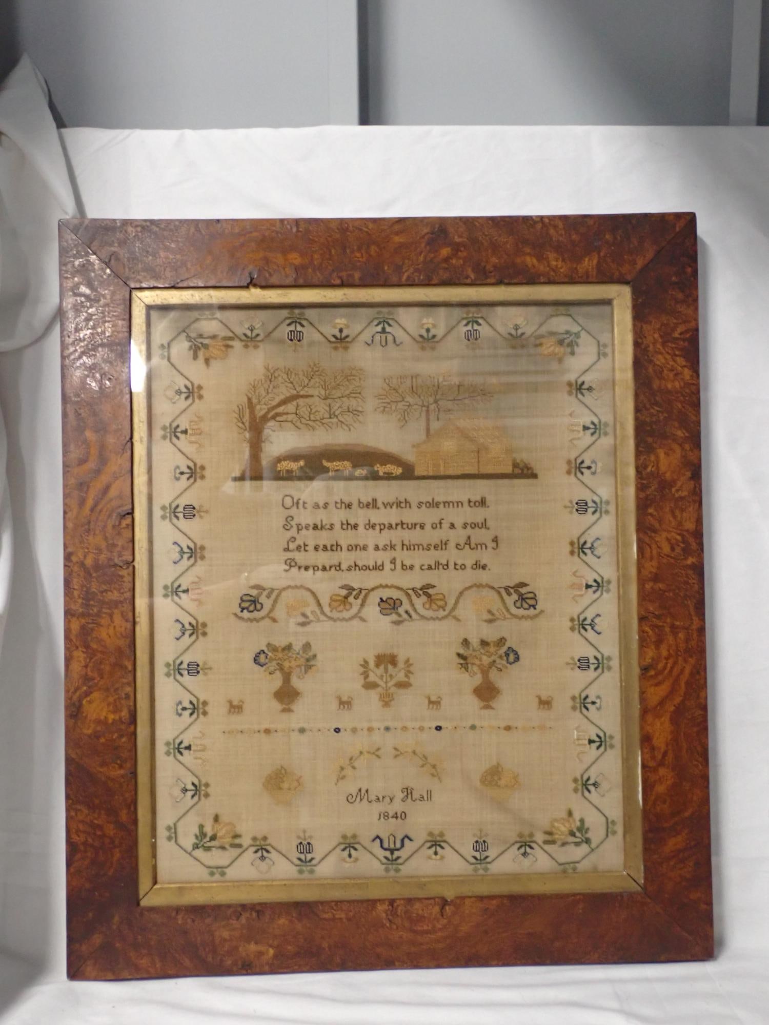 1840 Mary Hall Sampler: Mary Hall 1840. Verse in regards to death. Motif cottage , trees and animals . Floral and sheep. Fabric discoloration Vine and floral border Frame 20 1/2 x 18 1/4 Sampler 16 1/4 x 13 1/4