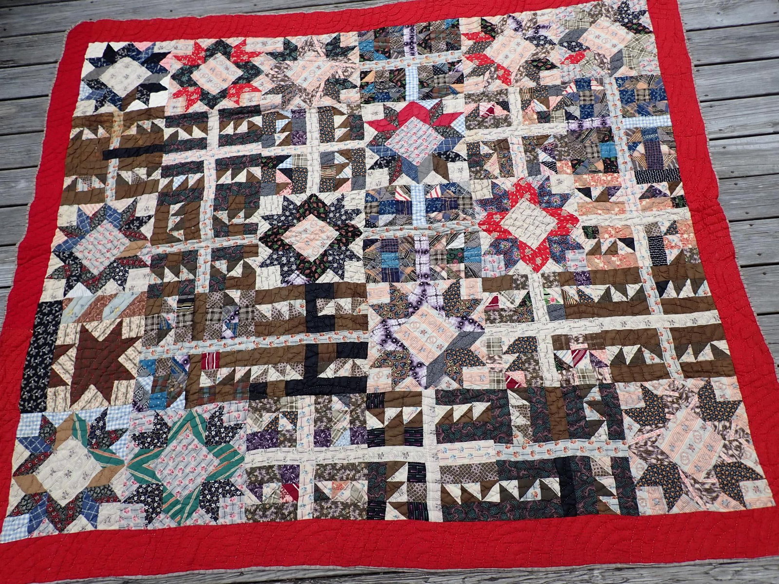 Quilt - Arrowhead Star/Star of Many Points 1925: 1925 - 1950. Appr. 85" x 72". Has small tear and a little staining near tear