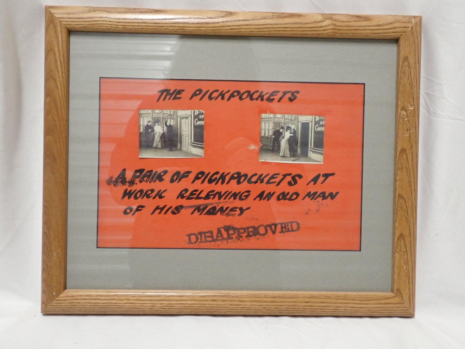 The Pickpocket: Poster good condition. 14 cards good condition. Mat 12" x 15". Poster 7" x 11". The consigner states that these items were acquired from the estate of the Manager of White City Amusement Park Arcade