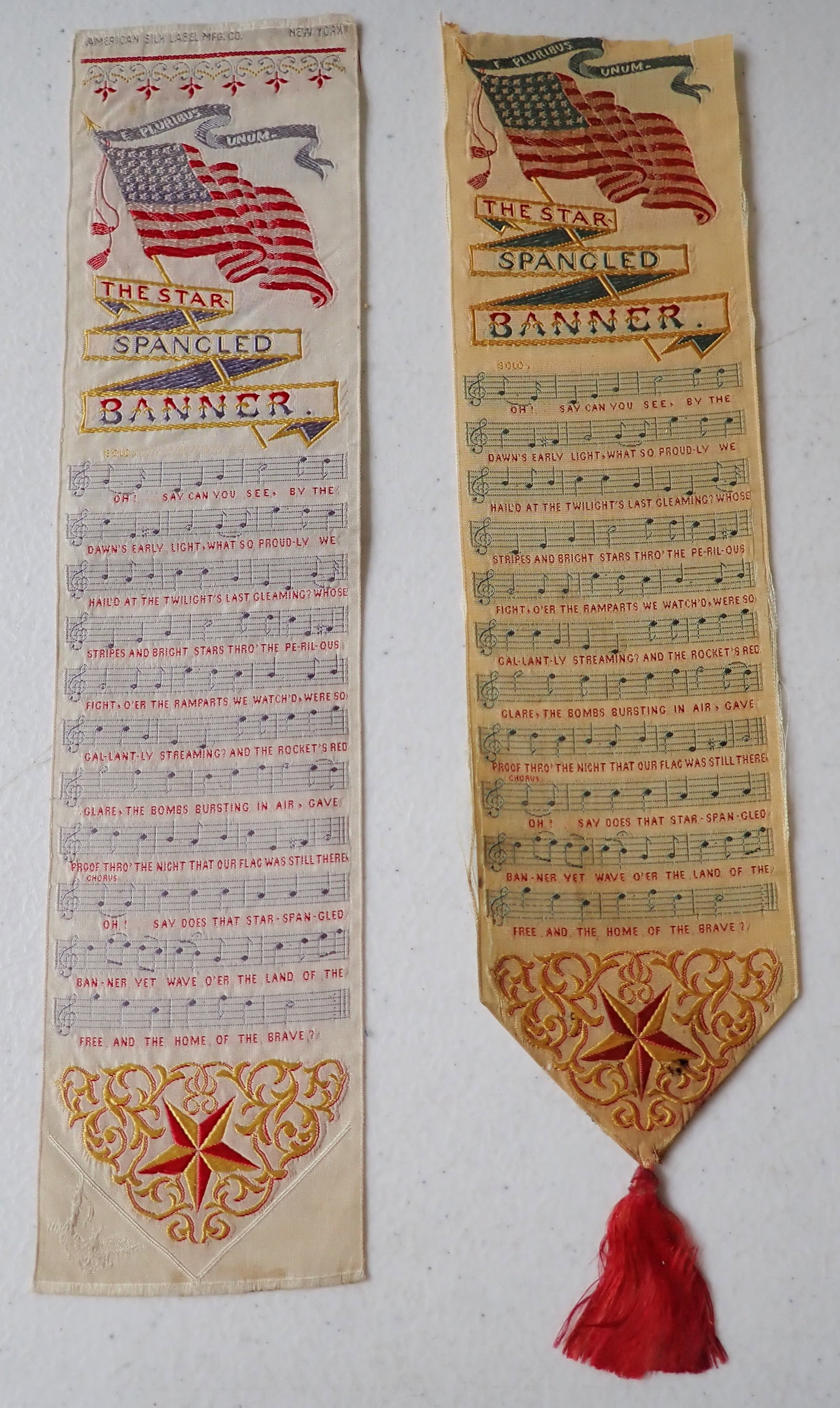 2 Patriotic Embroidered Silk Bookmark Ribbons Star Spangled Banner: 2 Patriotic Embroidered Silk Bookmark Ribbons. Star Spangled Banner Theme. 10 1/2 x 2 1/2 and 11" x 2 1/2" to end of tassel. Top missing on the one with tassel. Some fraying - see pictures.