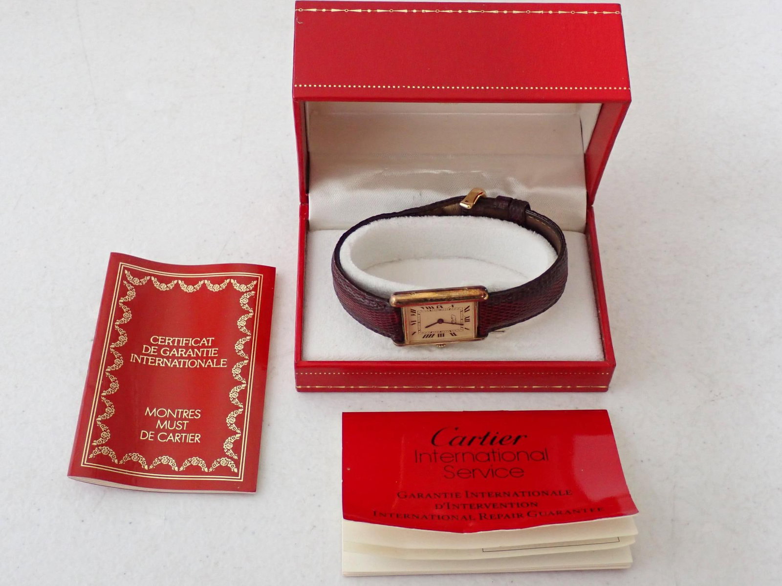 Cartier Wristwatch with Box: Marked: Cartier Paris Vermeil Tank Quartz. Argent 925 Plaque Org 20m Swiss Made 94927 590005 with Box