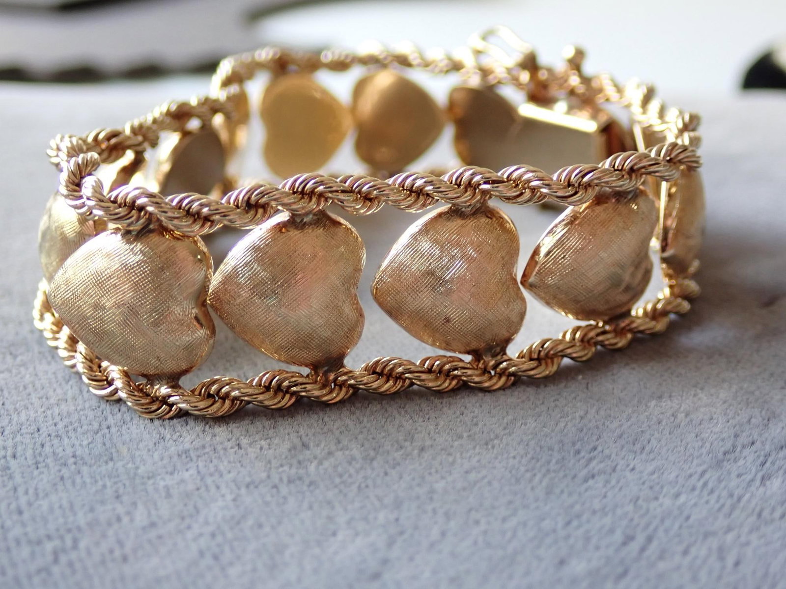 14K Gold Textured Heart & Rope Edge Bracelet: 7 1/2". 35.5 Grams. Appr. 3/4" wide. Comes with Appraisal.