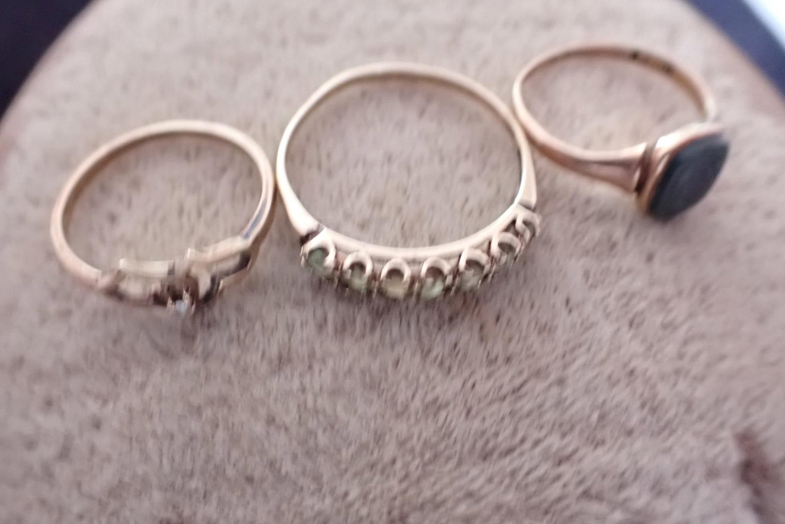 (3) 10K Gold Rings: Size 10 3/4 10K & Green stone (possibly peridot) ring, Size 6 10K Intaglio Ring, Size 5 3/4 10K Heart Ring - 4.4 Grams