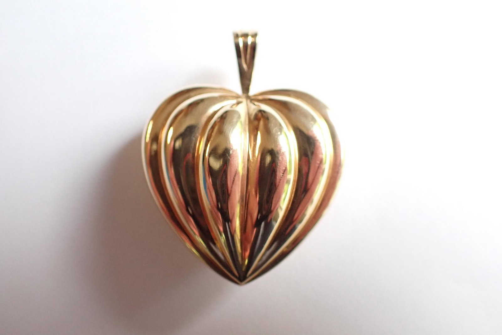 14K Heart Pendant: 1 1/8" x 1 1/8 and 1 1/2 tall with Bail. 3.5 Grams