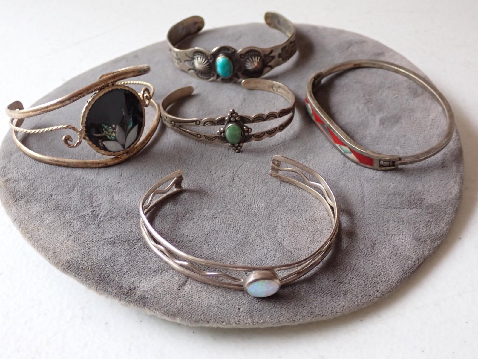 Sterling and Other Cuffs/Bracelets: Coin Silver, Marked Silver Products with Green stone Cuff, Mexico Silver and Enamel Cuff, unmarked with Turquoise Stone cuff, Sterling 925 and Inlaid stones Cuff and 925 Sterling and Opal Cuff