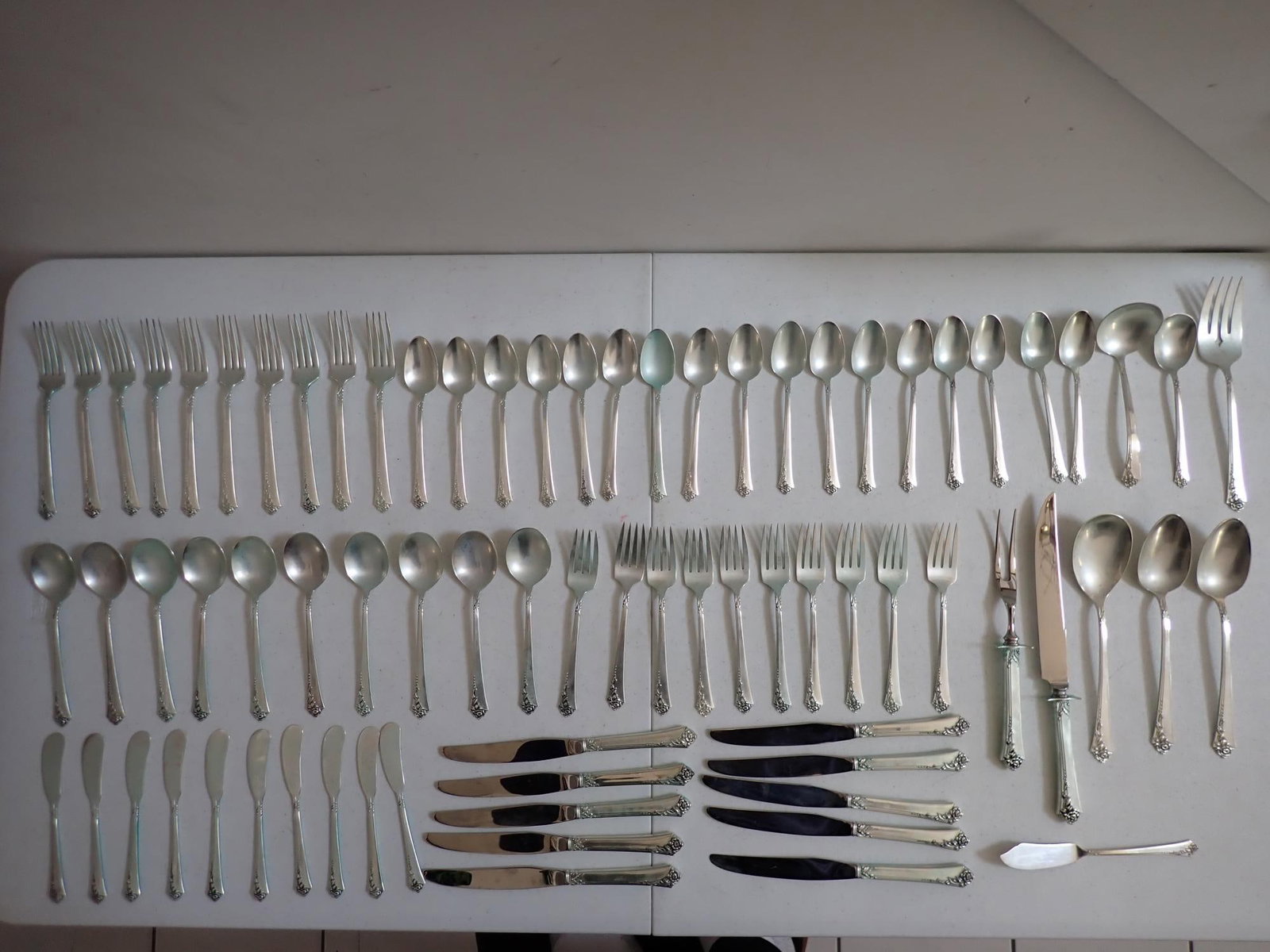 Heirloom Sterling Flatware Set: Has blue tinge from the cleaning - 75.6 troy ounces - Weighed without Knives