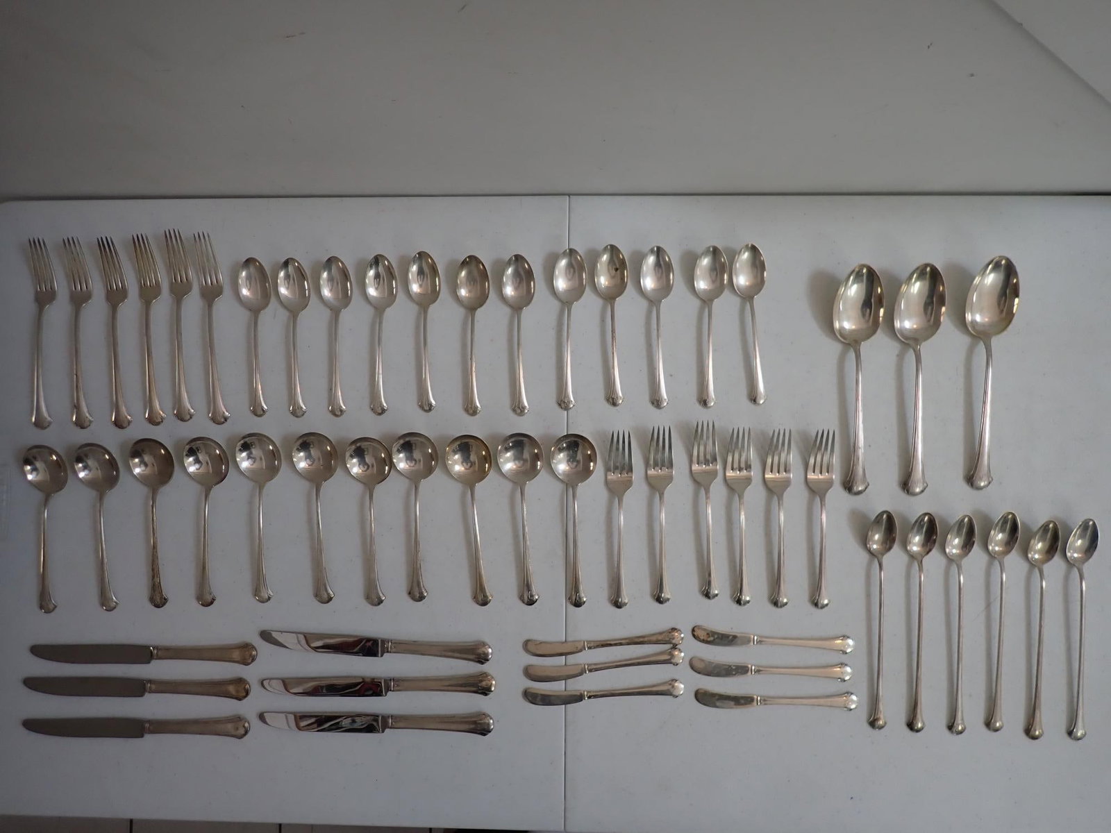 Towle Chippendale Sterling Flatware Set 56 Piece: 55.5 troy ounces - 56 Pieces including Serving Pieces. Monogrammed. Pat. 1937. Weighed without knives