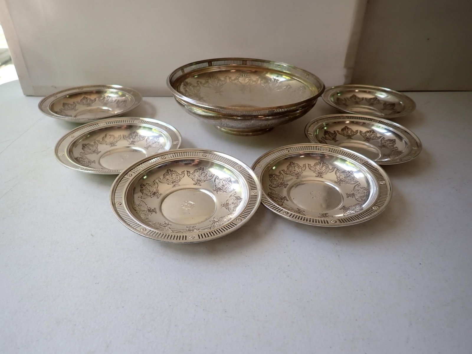 Towle Sterling Bowl and 6 Trays: 8 1/2" Bowl and (6) 5 1/2" Trays. Bowl is marked 5259 and Tray is marked 5075. 24.4 troy ounces.