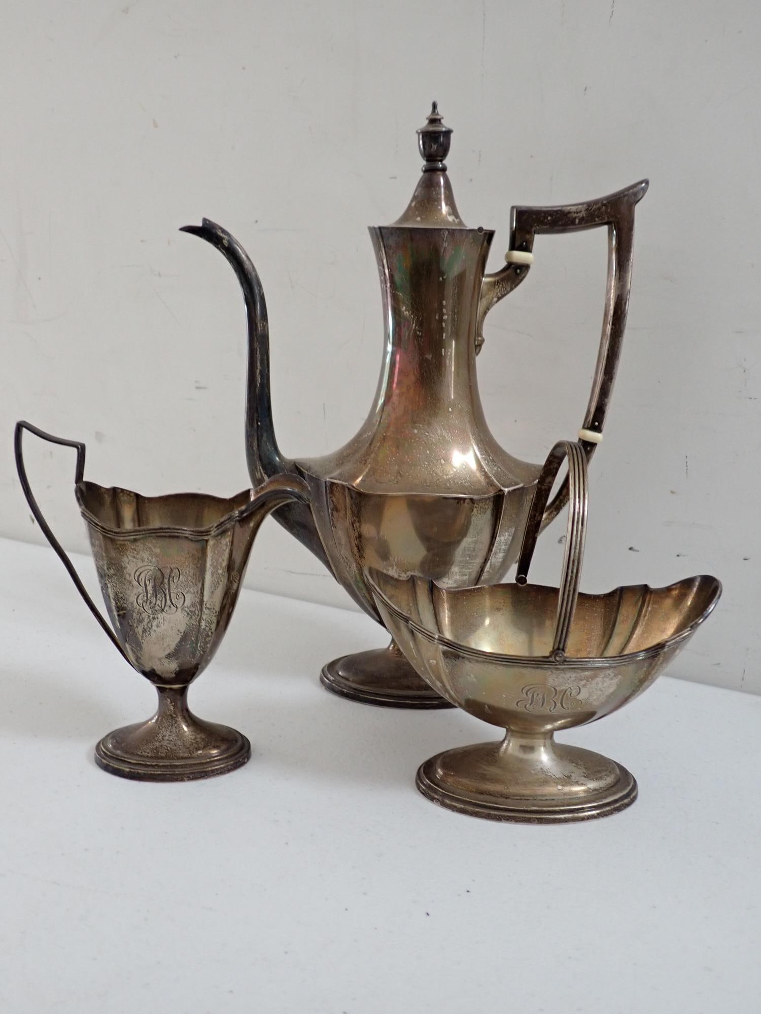 3 Piece Gorham Plymouth Sterling Silver Coffee Set: No. 2311 10 1/4" Coffee Pot, A No. 2313 Sugar Bowl 5 1/2" with handle and 2314 Creamer 5 1/2". Good Condition. Monogrammed. 23.3 troy ounces.
