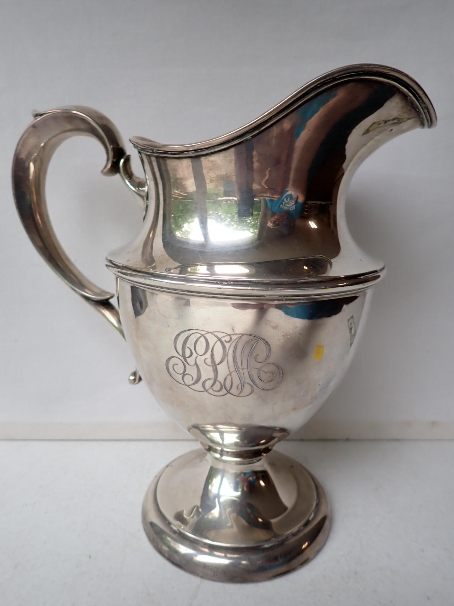 Sterling Silver 3 1/2" Pints Water Pitcher: Appr. 9 1/2". Marked 8562. 22.7 troy ounces.