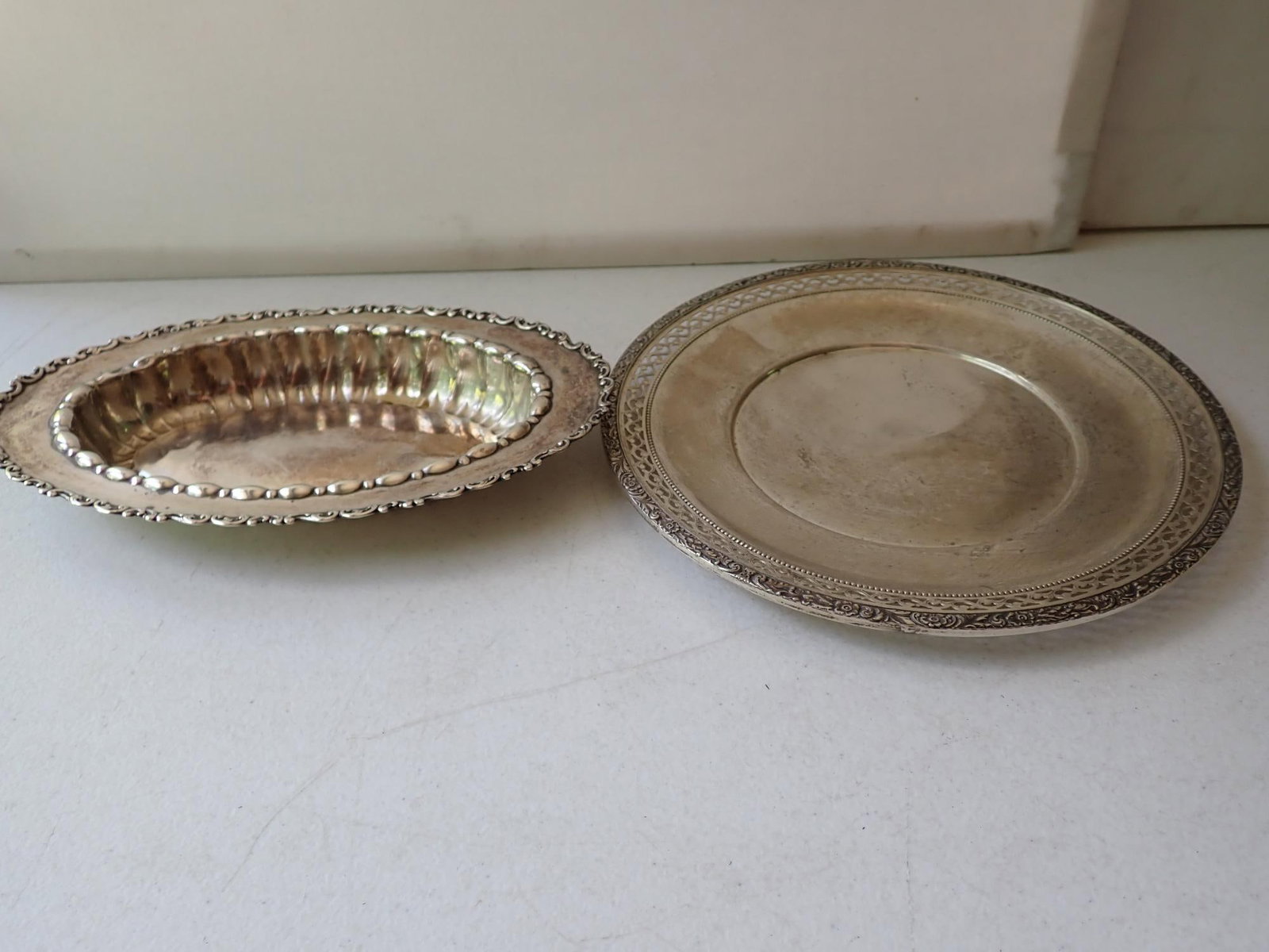 Sterling Silver Oval Bowl and Wallace Plate: Sterling 4566 Oval Bowl 9" and 9" reticulated L80 Plate Wallace. 10.2 troy ounces.