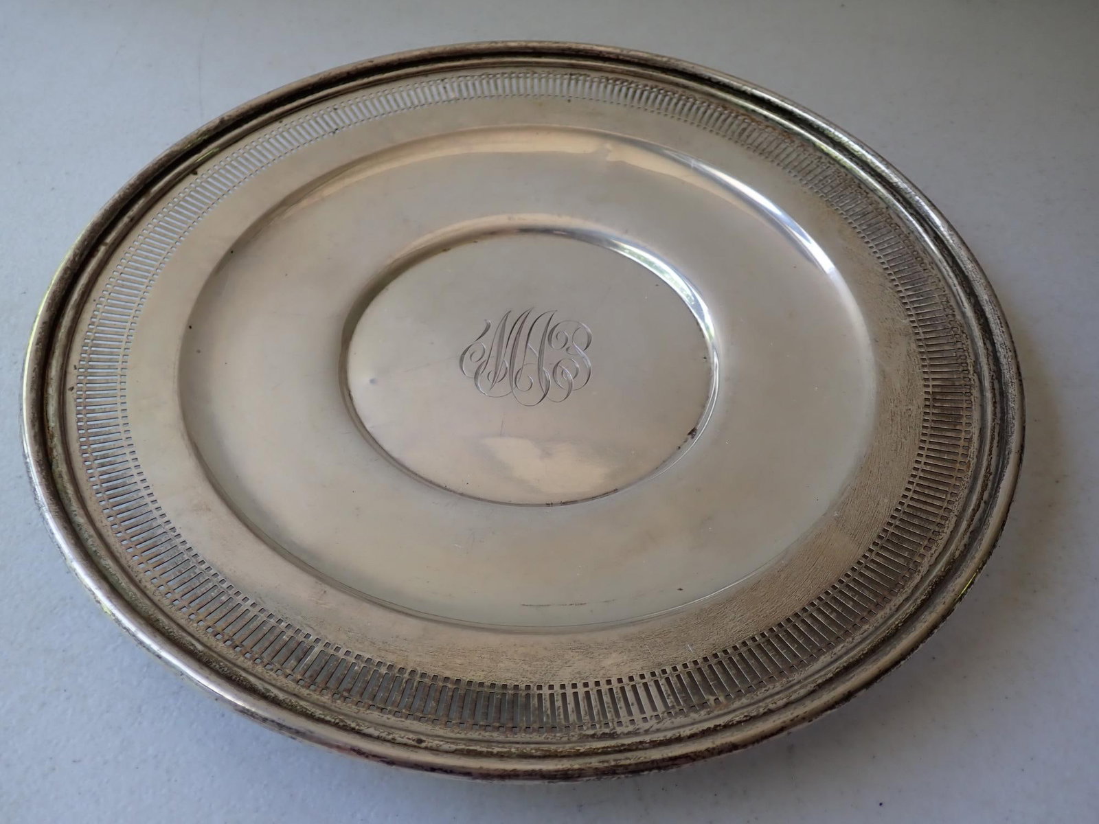 Sterling Silver 11" Platter Reticulated: Monogrammed. Marked Sterling A56. 9.5 troy ounces.