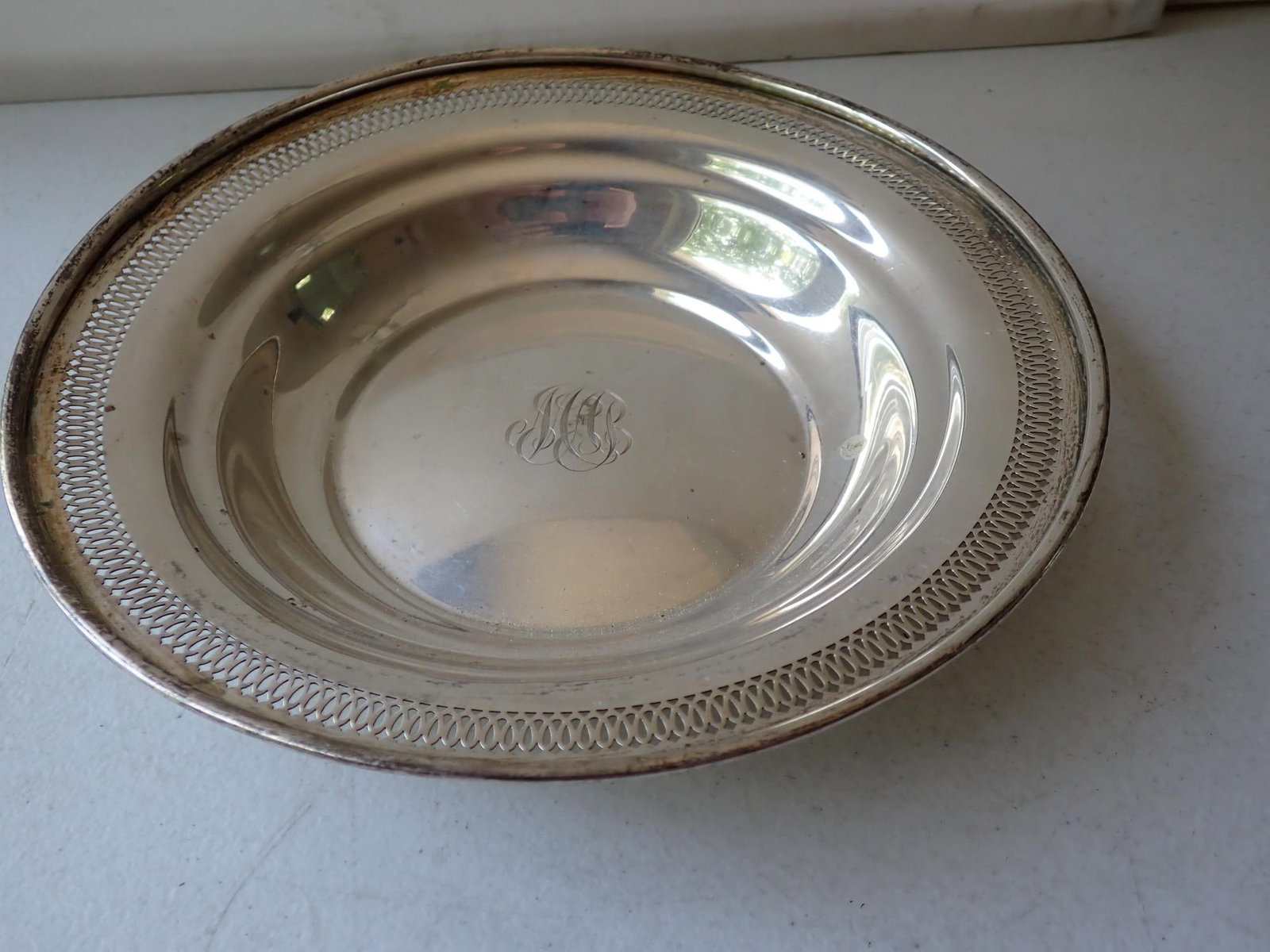 Sterling Silver 9 1/2" Reticulated Bowl: Marked 2982 A. 9.0 troy ounces.