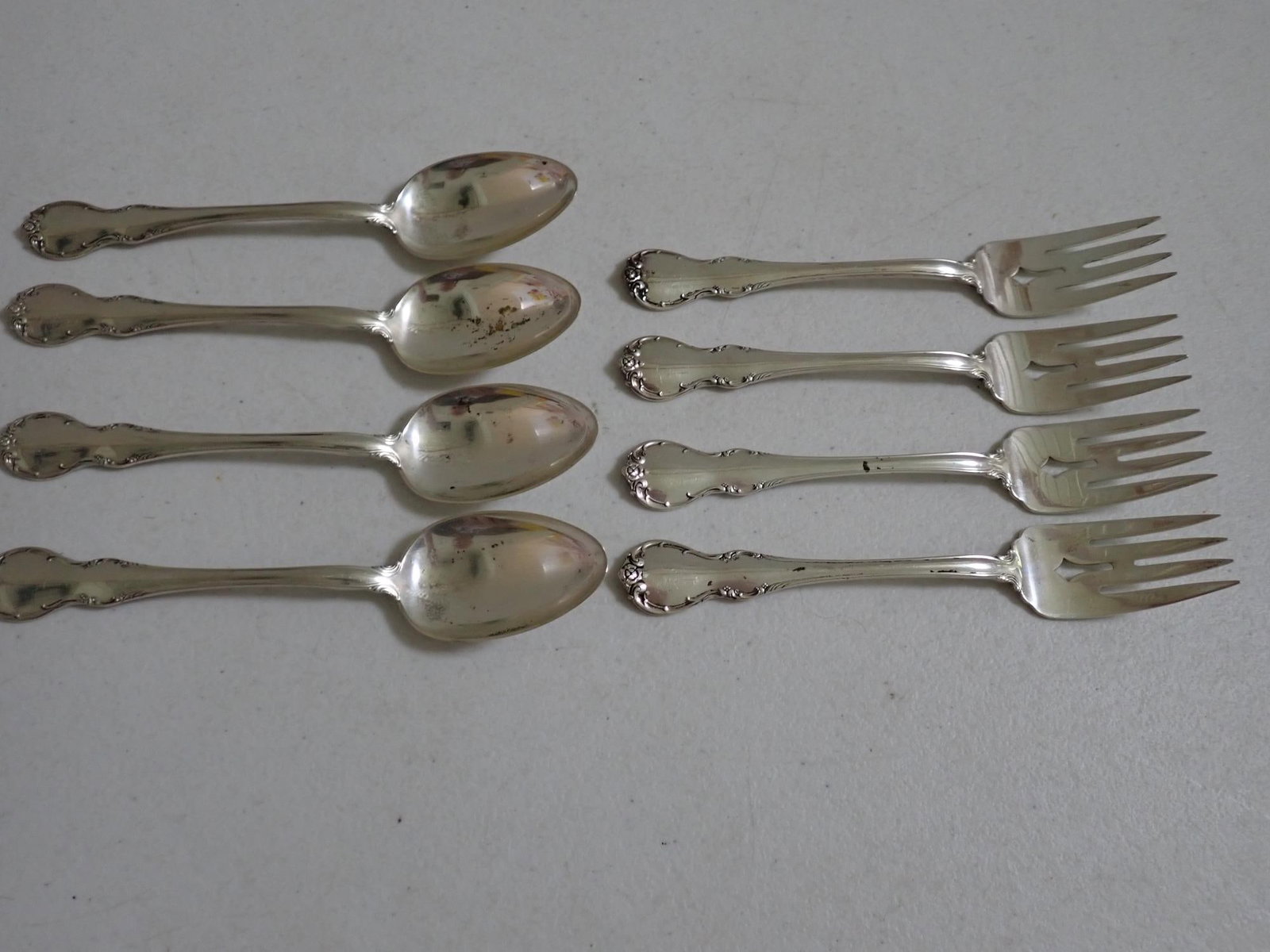 Towle Sterling 4 Forks and 4 Teaspoons: 8.6 troy ounces.