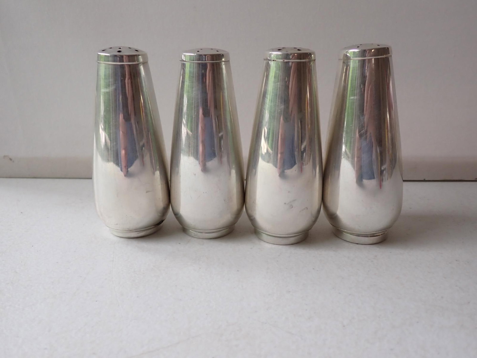 (4) International Sterling Salt & Pepper Shakers: 4". 8.2 troy ounces.
