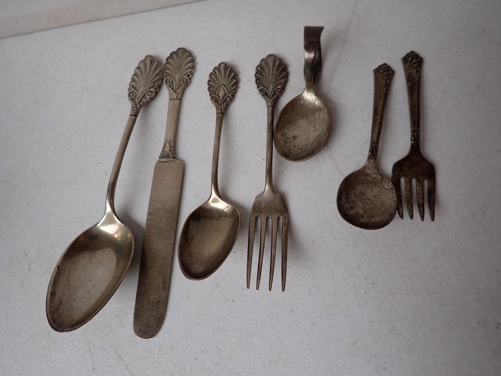 Sterling Silver Serving and Other Pieces: Sterling 1861 A. Stowell & Co. Serving Knife, Serving Spoon, Teaspoon and Fork, Heirloom Sterling Baby Spoon & Fork and Oher Spoon. 6.65 Troy Ounces