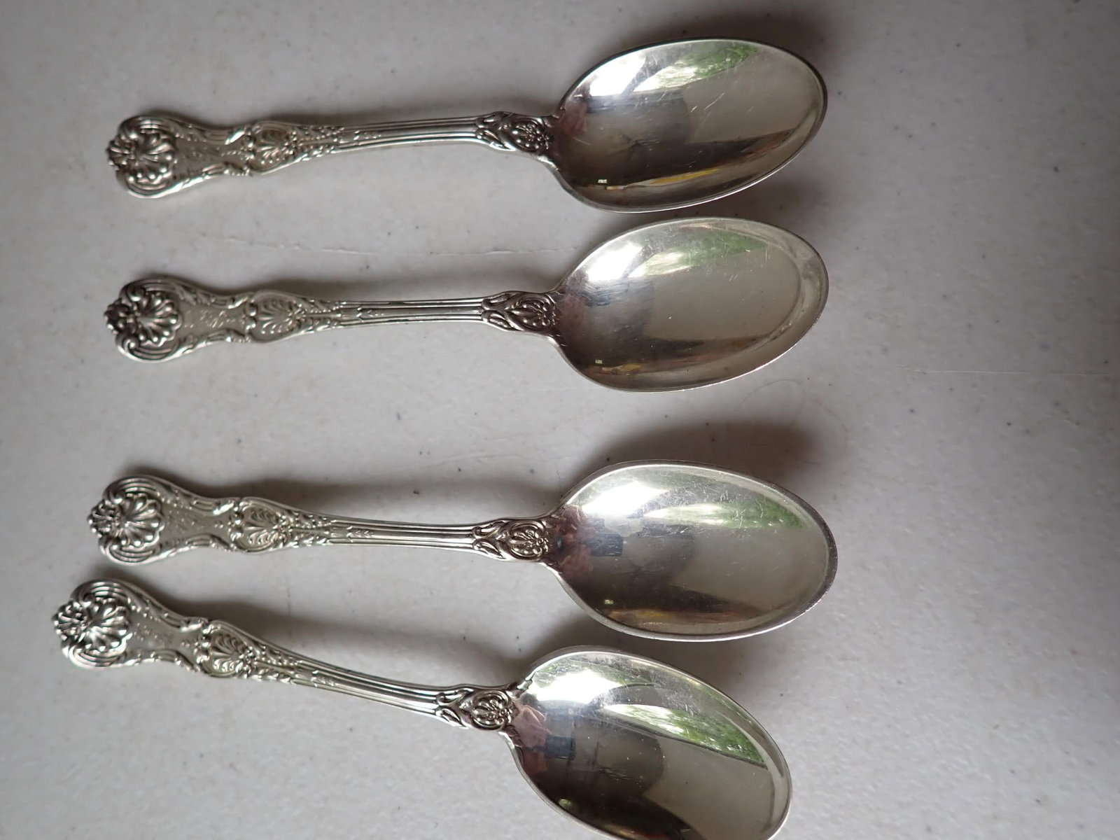 4 King George Gorham 1894 Sterling Teaspoons: 5.1 troy ounces.