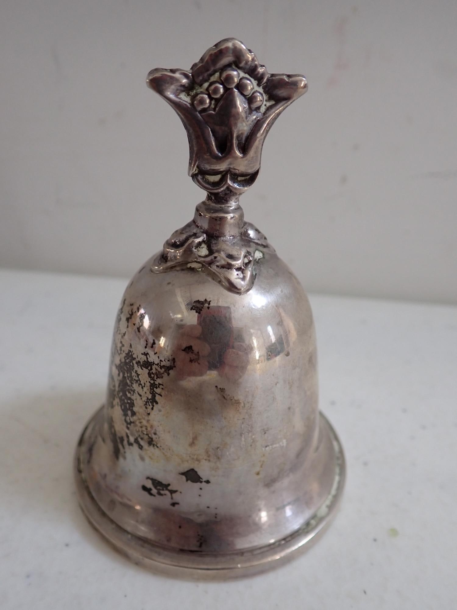 Tiffany Sterling G98 Marked Bell: 2.8 troy ounces.