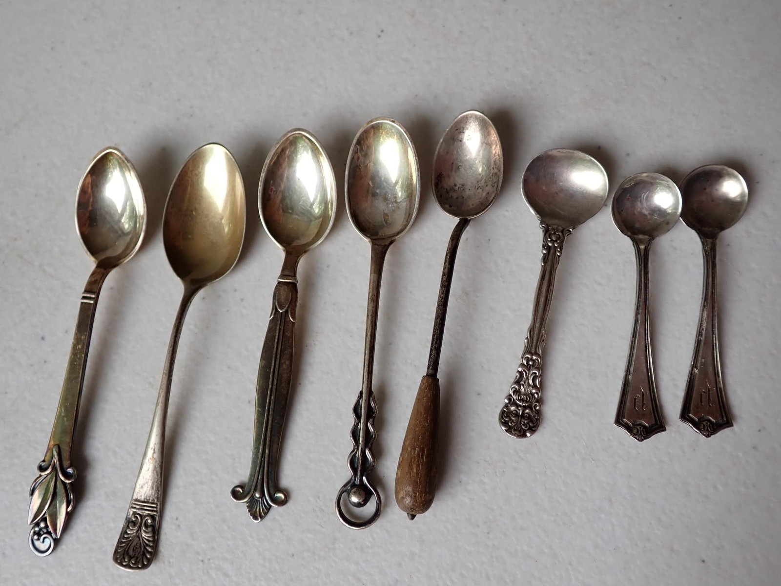 Sterling 5 Demitasse and 3 Salt spoons.: 1 with wood handle. 1.4 troy ounces.