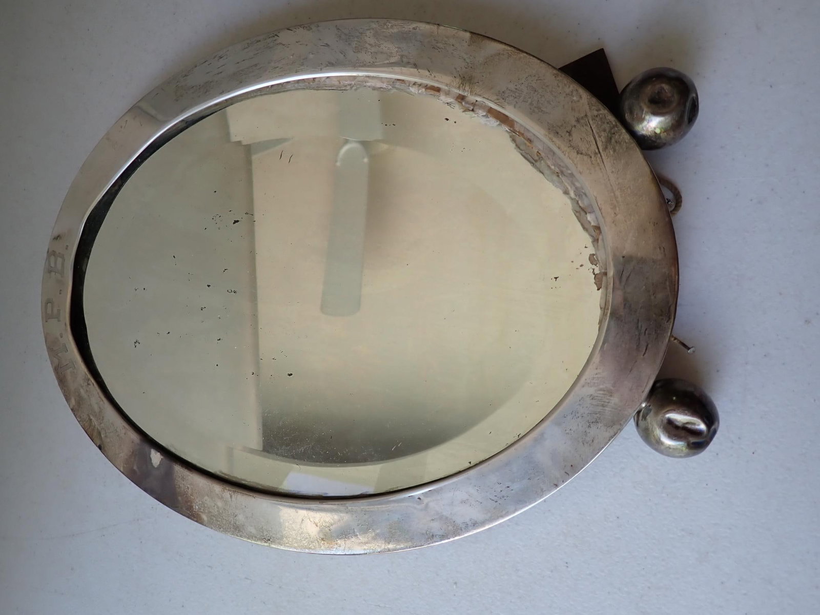 Sterling Easel Back Vanity Mirror: Monogrammed M.P.B. 14" x 10". Beveled mirror. Sterling Frame. Has some denting on top and on feet.