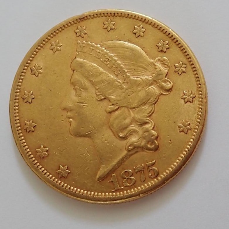1875 Double Eagle $20 Gold Coin: Ungraded as found in estate.