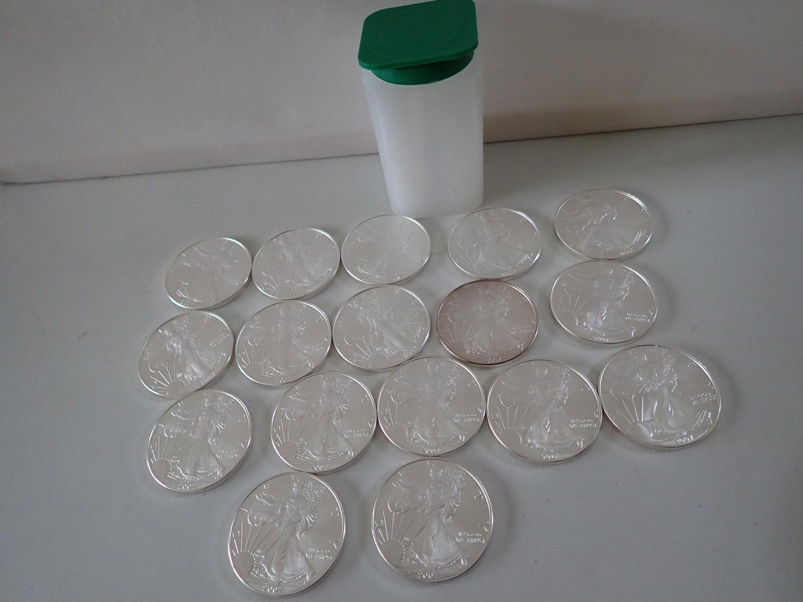 17 American Eagle Silver Coins: Each coin is one ounce of .999 silver