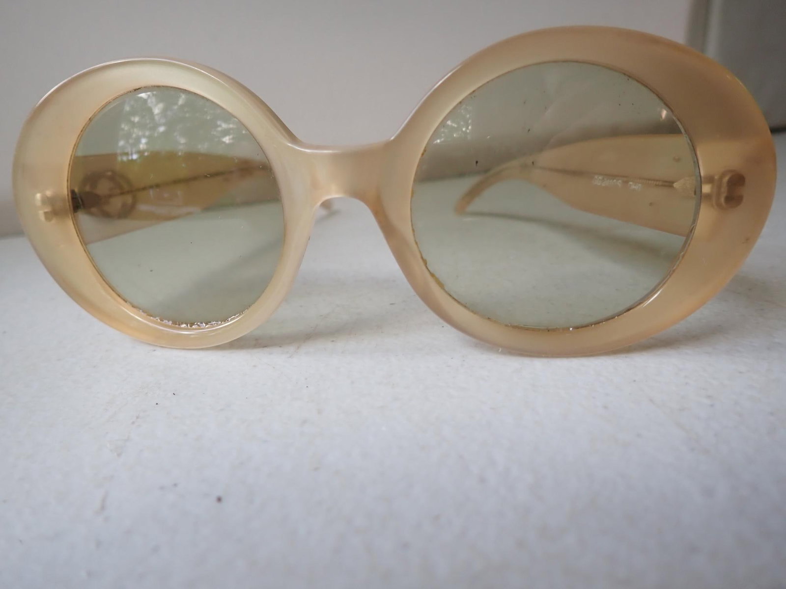 Vintage Gucci Sunglasses: Made in Italy. Lightly tinted sunglasses. Marked with Model Number. Show some wear with some soiling.