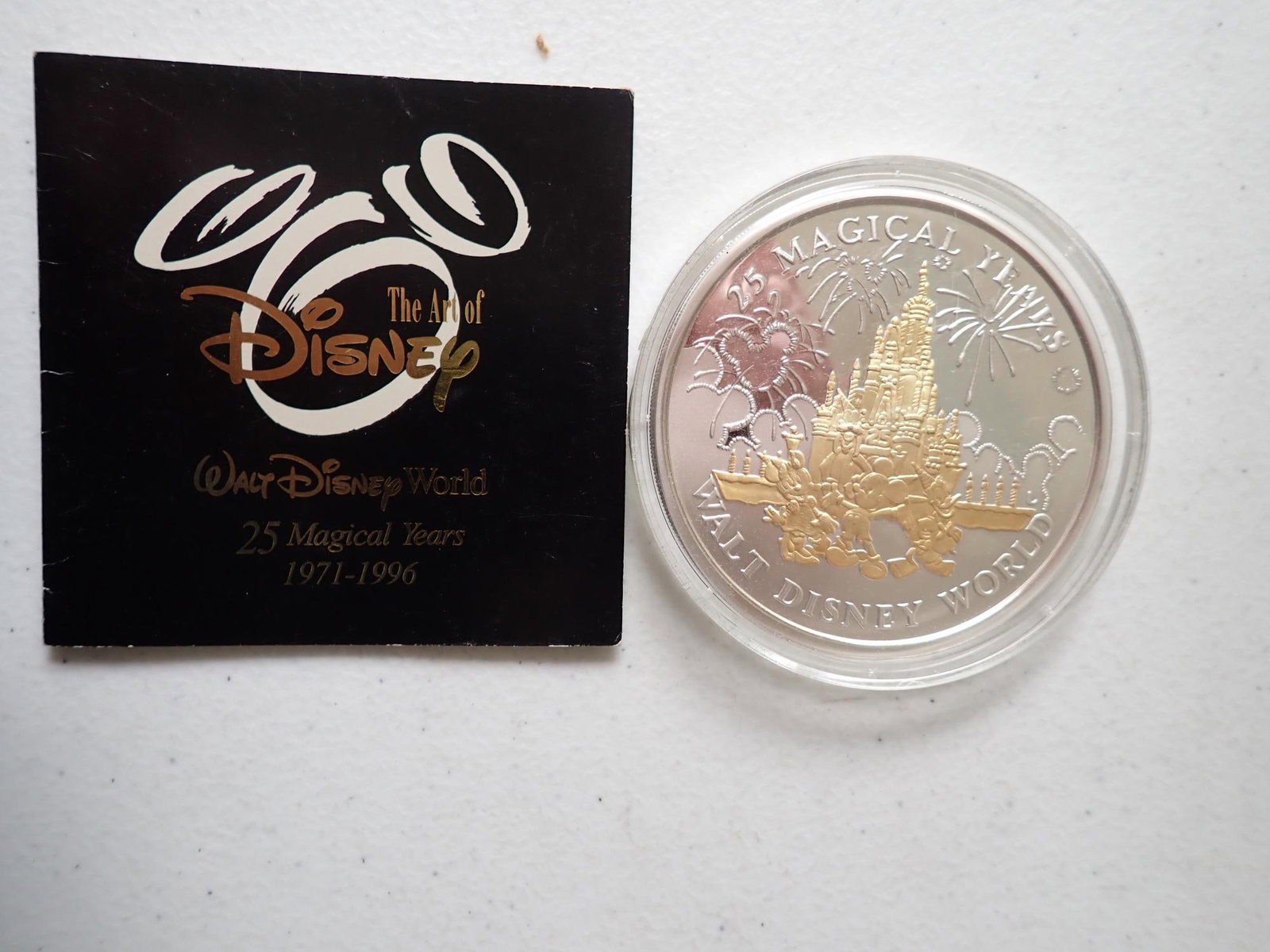 1999 Disney Liberty Mint 5 ounce Coin: Proof 1971-1996 Walt Disney World "25 Magical Years Walt Disney World" coin. .999 silver with 24K gold plating. Limited edition of 1,000. Has Certificate of Authenticity.