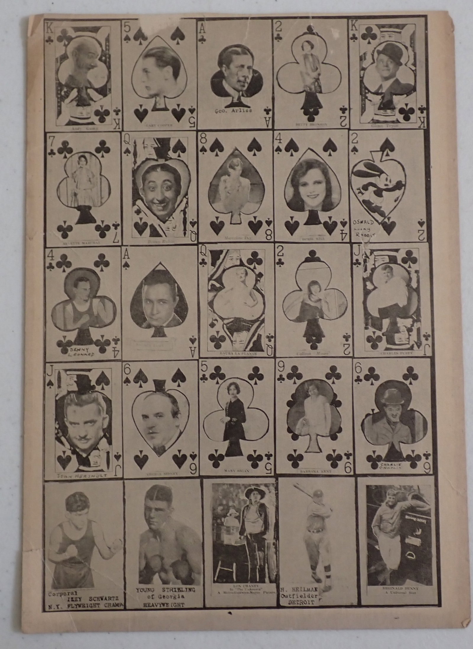 W565 Harry Heilmann, Boxers, etc. Strip Cards Sheet: Sheet of stars of entertainment and sports. Hall of Famer Harry Heilmann. Boxers Benny Leonard, Young Stribling, and Izzy Schwartz. Oswald the Lucky Rabbit. Charlie Chaplin, Lon Chaney, Gary Cooper, a