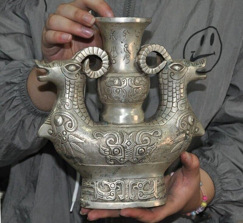 Chinese bronze silver wine vessel: Size: Height 21 cm - Width 18.5 cm Materials: Bronze Silver Time Period: Han dynasty Manufactured Date: 1st-c Period Period Origin: China